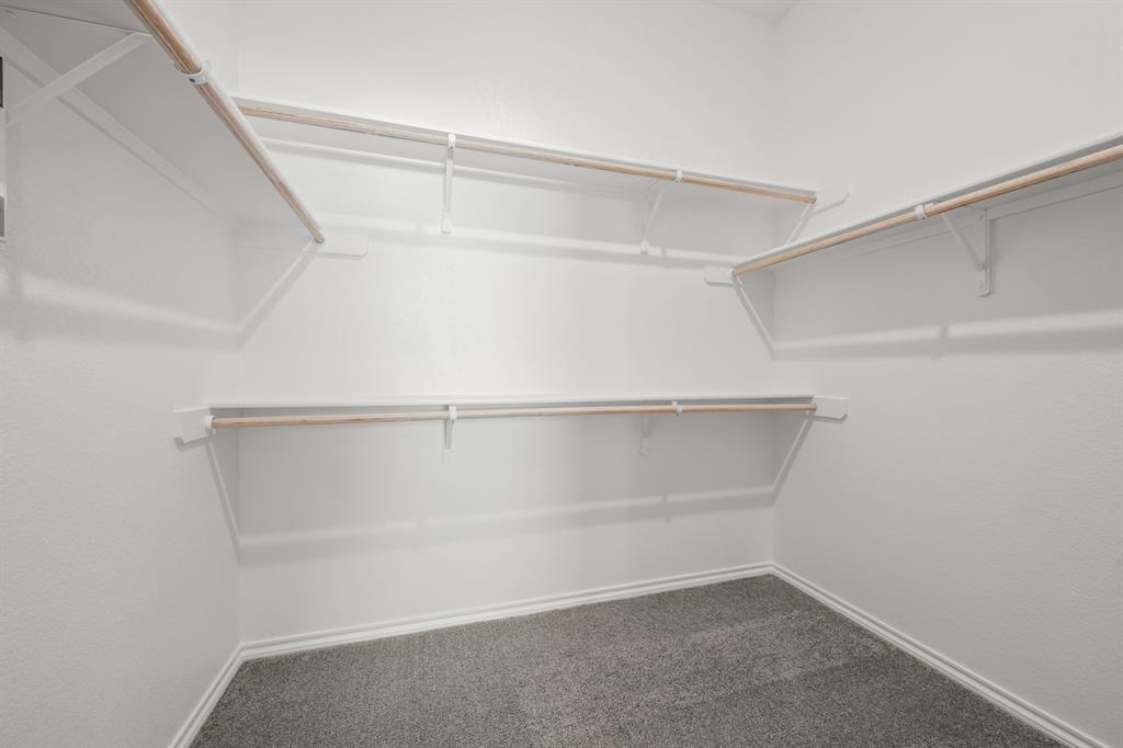 10809 Rothland Street Crowley, TX 76036 - Photo 23 of 30 a view of an empty walk in closet