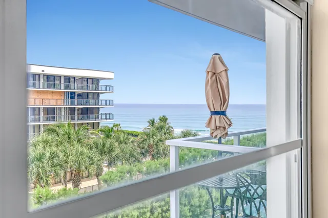 a bedroom with a bed and a table in it