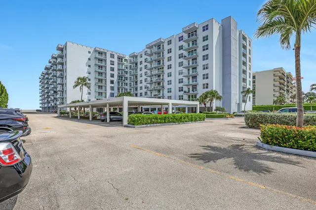 a view of a city street lined with tall buildings