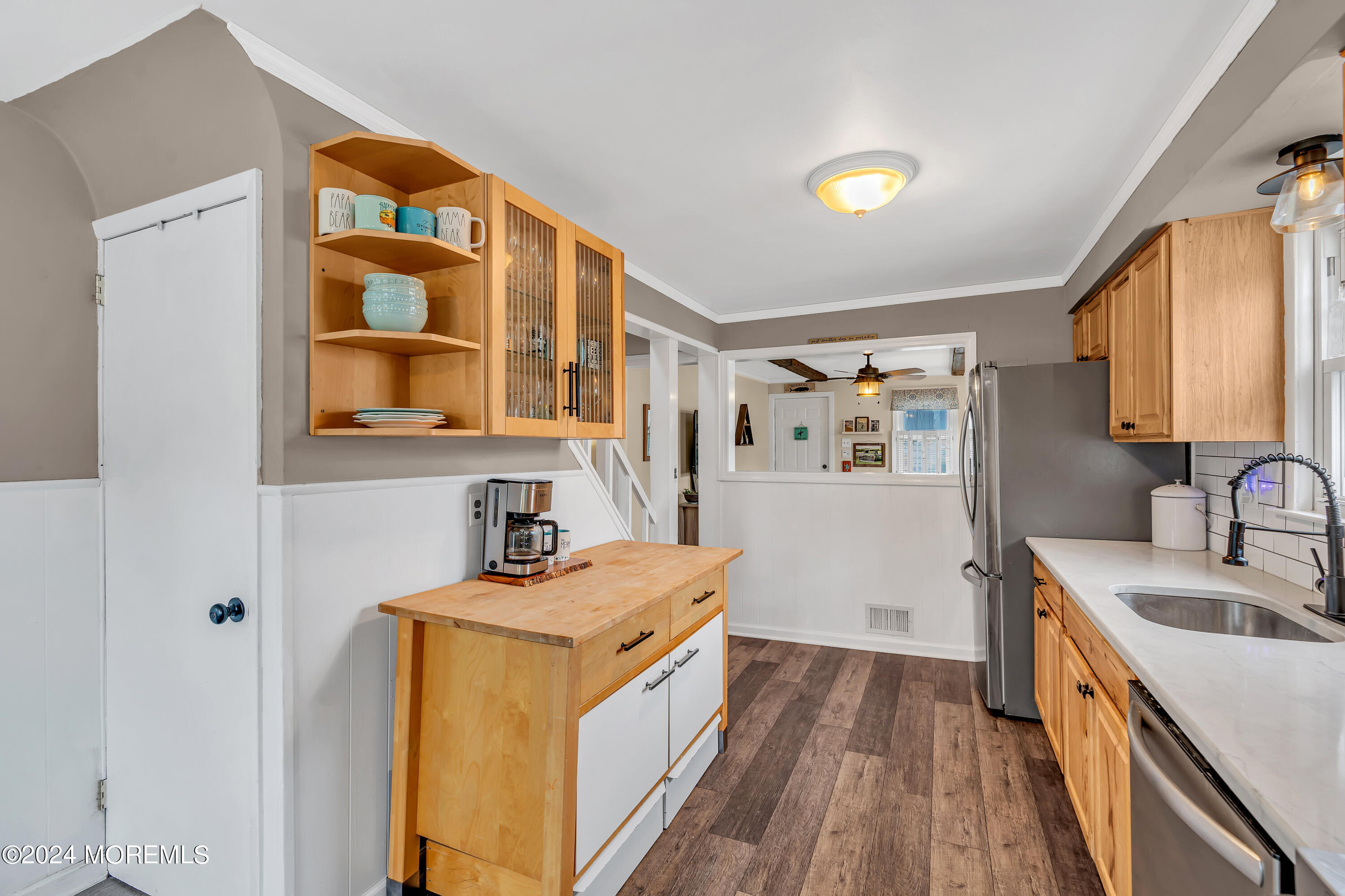 1507 Edgemere Road Wall, NJ 07719 - Photo 13 of 32 a kitchen with a sink a stove and a refrigerator