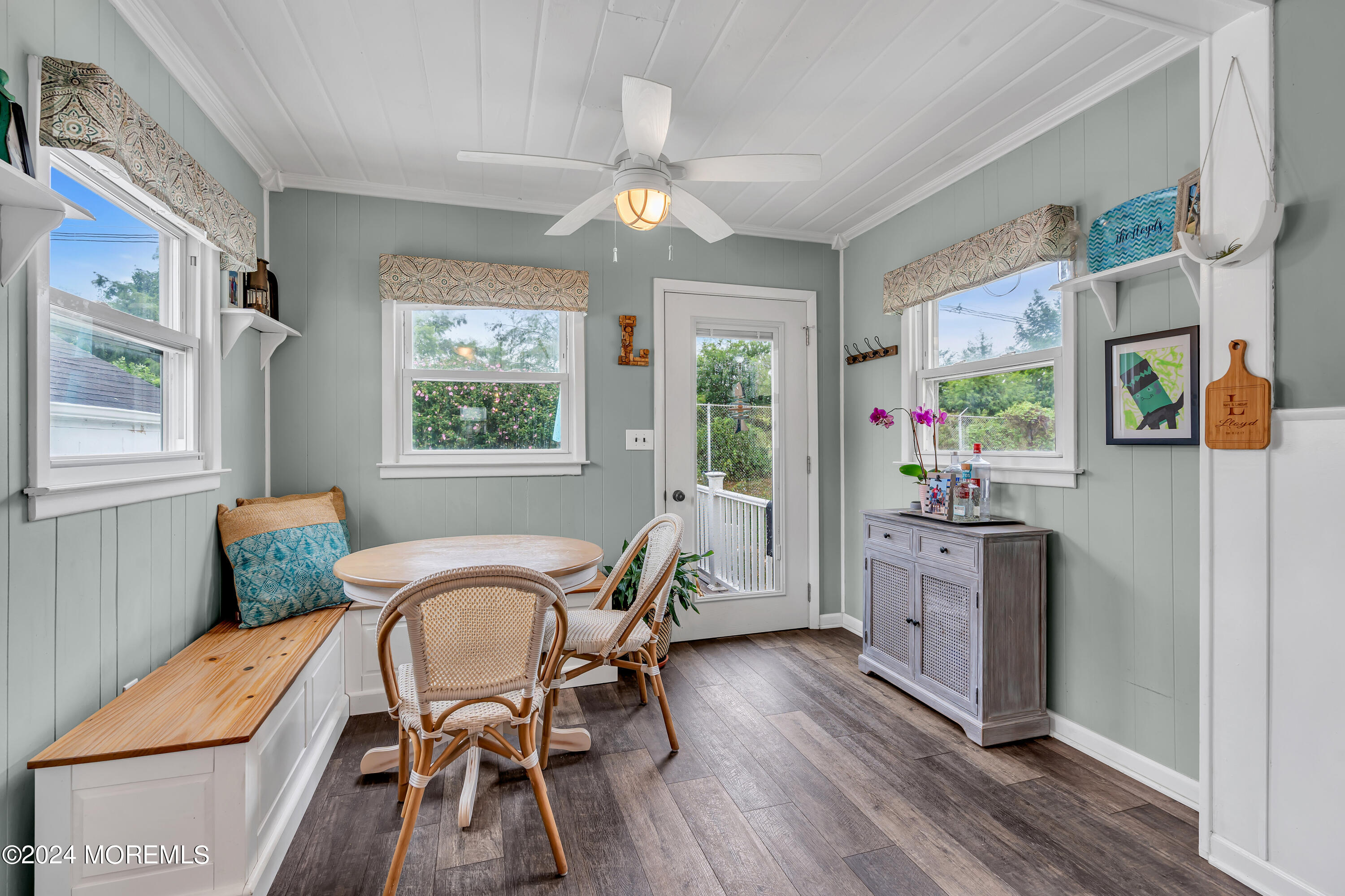1507 Edgemere Road Wall, NJ 07719 - Photo 14 of 32 a view of a dining room with furniture window and wooden floor