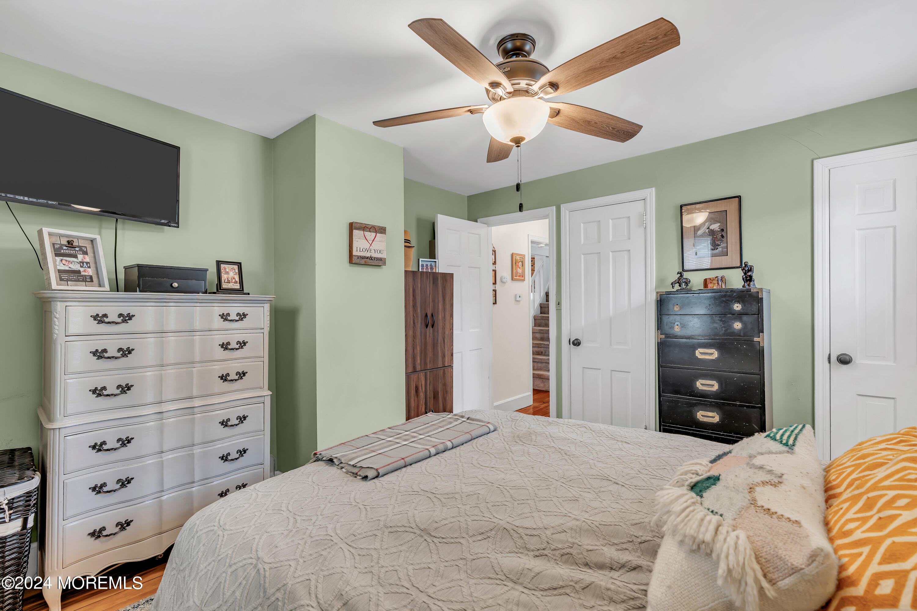 1507 Edgemere Road Wall, NJ 07719 - Photo 17 of 32 a bedroom with a bed dresser and a window