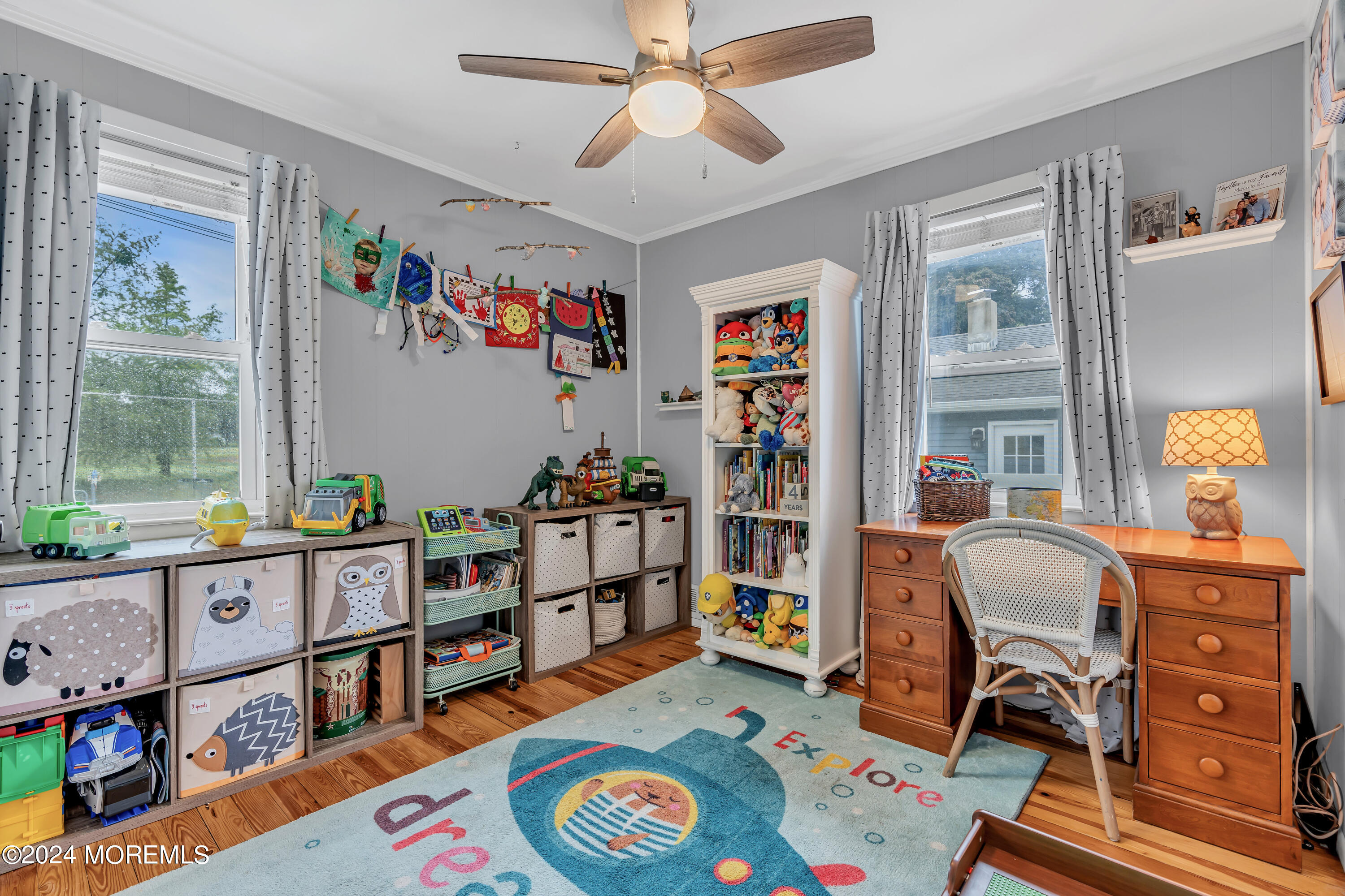 1507 Edgemere Road Wall, NJ 07719 - Photo 18 of 32 a reading room with furniture and a book shelf