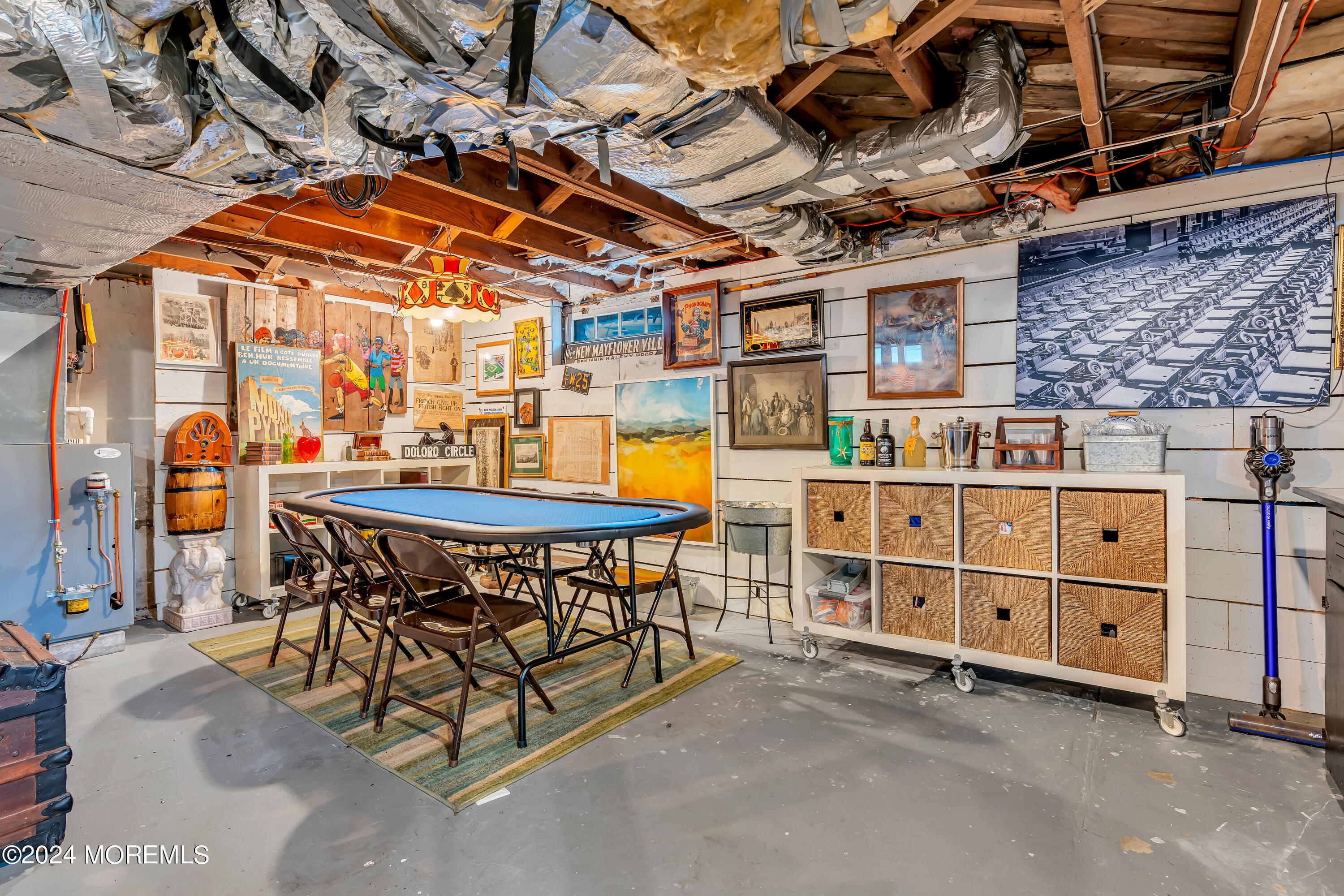 1507 Edgemere Road Wall, NJ 07719 - Photo 25 of 32 a roof deck with a table and chairs