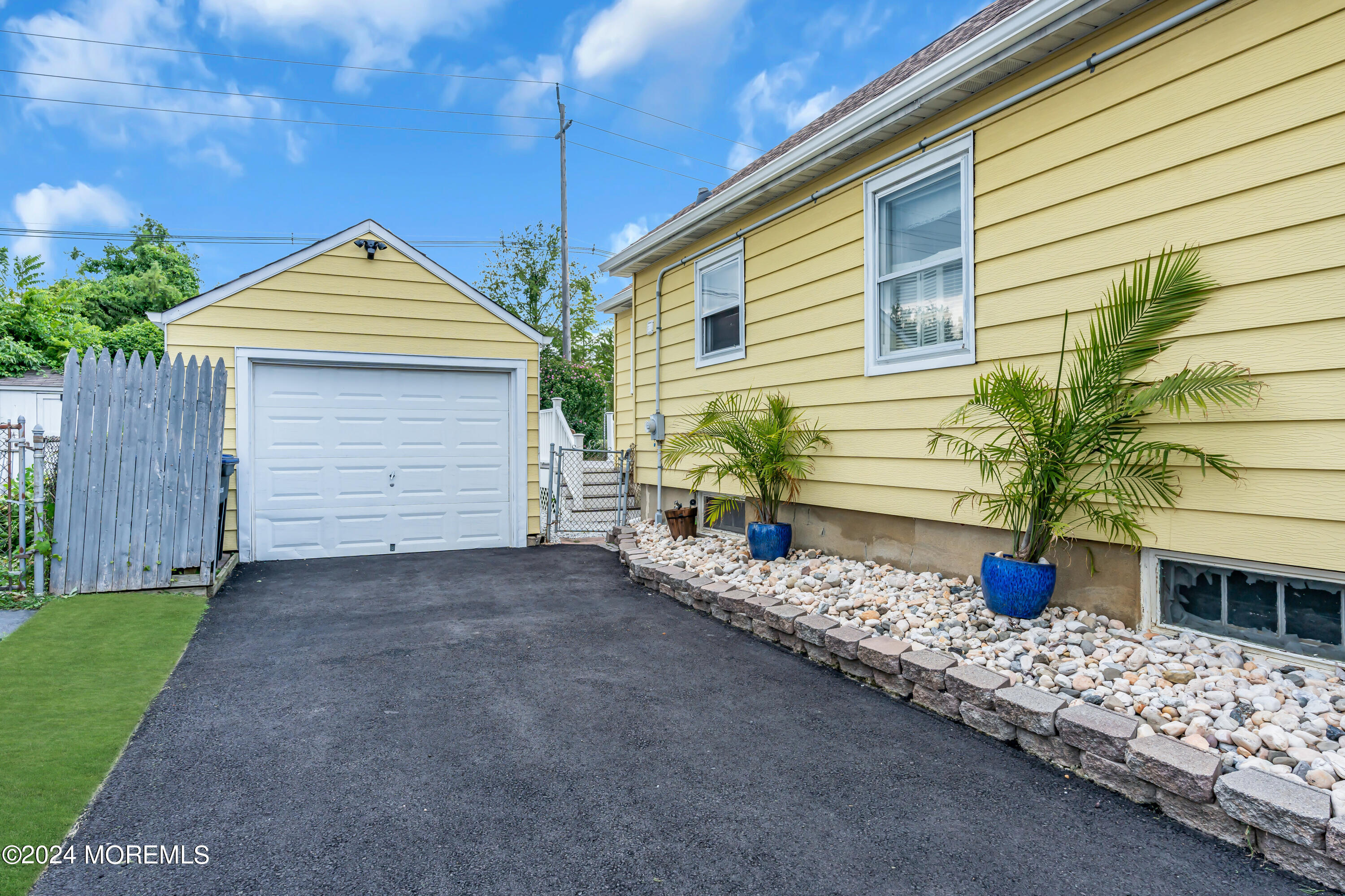 1507 Edgemere Road Wall, NJ 07719 - Photo 31 of 32 a front view of a house with entryway