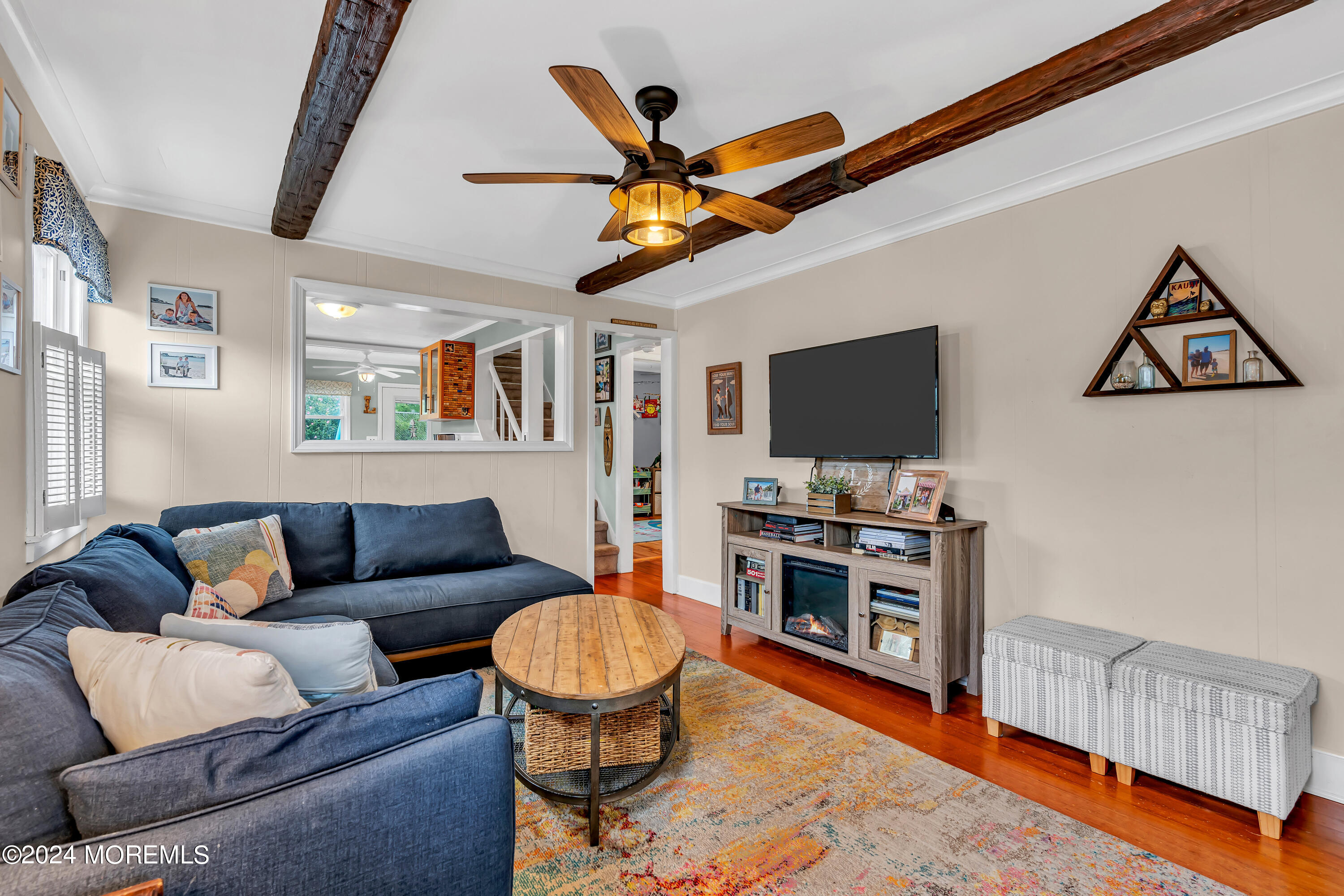 1507 Edgemere Road Wall, NJ 07719 - Photo 8 of 32 a living room with furniture and a flat screen tv