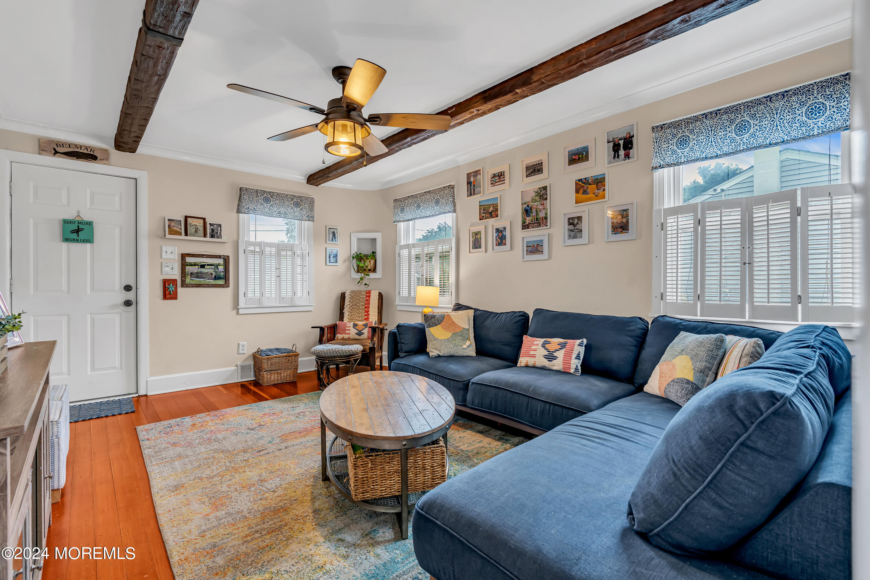 1507 Edgemere Road Wall, NJ 07719 - Photo 9 of 32 a living room with furniture a rug and a window