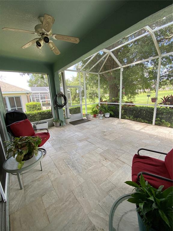 4202 Hammersmith Drive Clermont, FL 34711 - Photo 70 of 73 a view of a porch with furniture