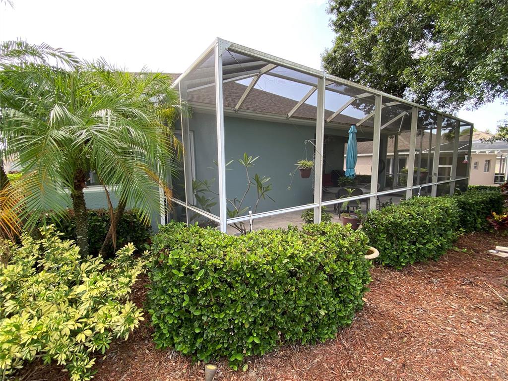 4202 Hammersmith Drive Clermont, FL 34711 - Photo 8 of 73 a view of a garden