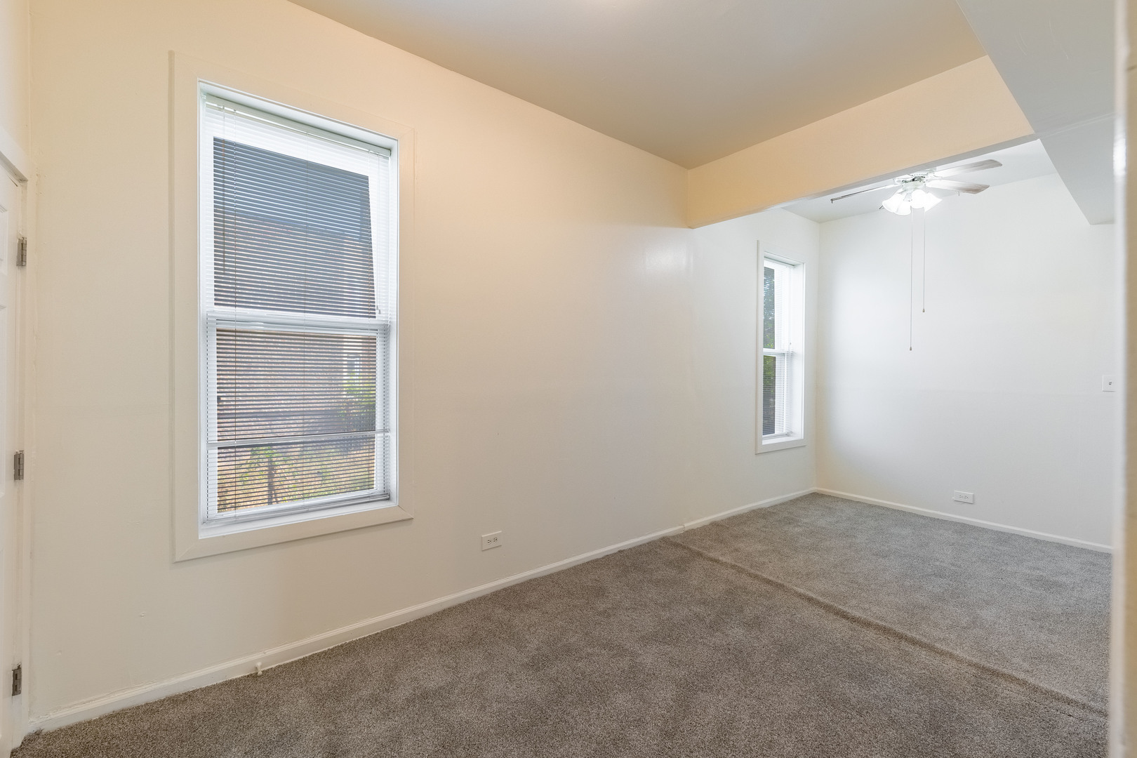 4823 South Indiana Avenue Chicago, IL 60615 - Photo 11 of 30 a view of an empty room with a window