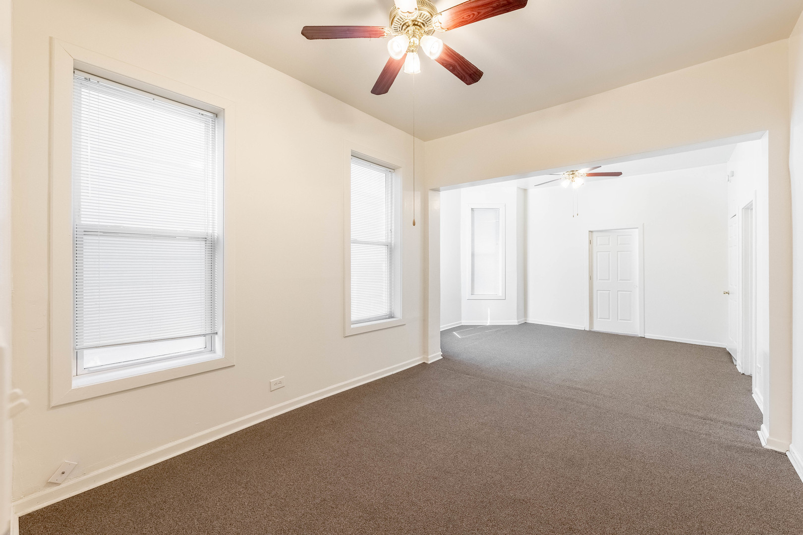 4823 South Indiana Avenue Chicago, IL 60615 - Photo 8 of 30 a view of an empty room with a window