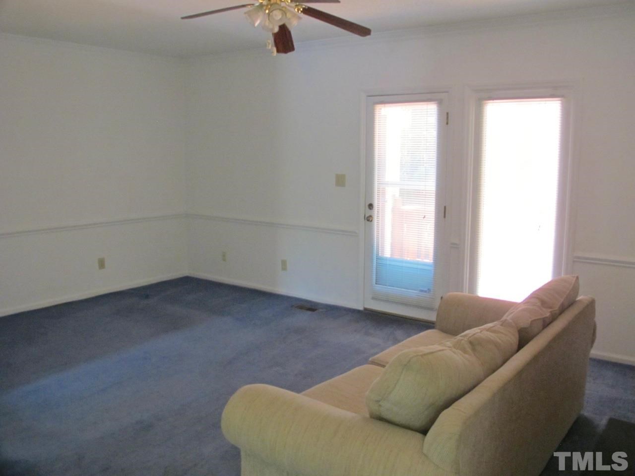2063 Trexler Court Raleigh, NC 27606 - Photo 8 of 21 a living room with furniture and window