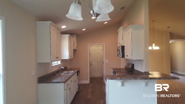 1733 Firefly Lane Foley, AL 36535 - Photo 22 of 30 kitchen from breakfa