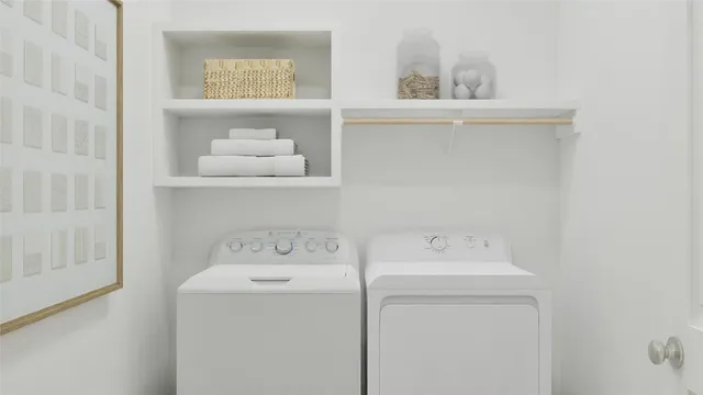 a utility room with dryer and washer