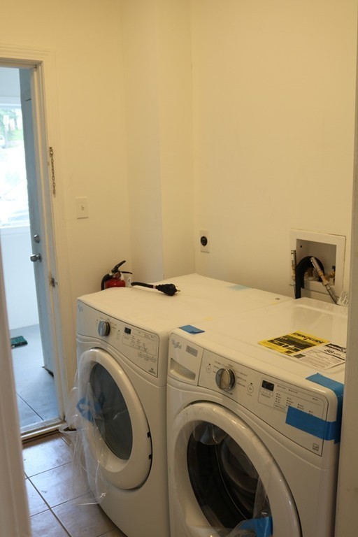 69 Catharine Street, Unit 3 Worcester, MA 01605 - Photo 10 of 17 a utility room with dryer and washer