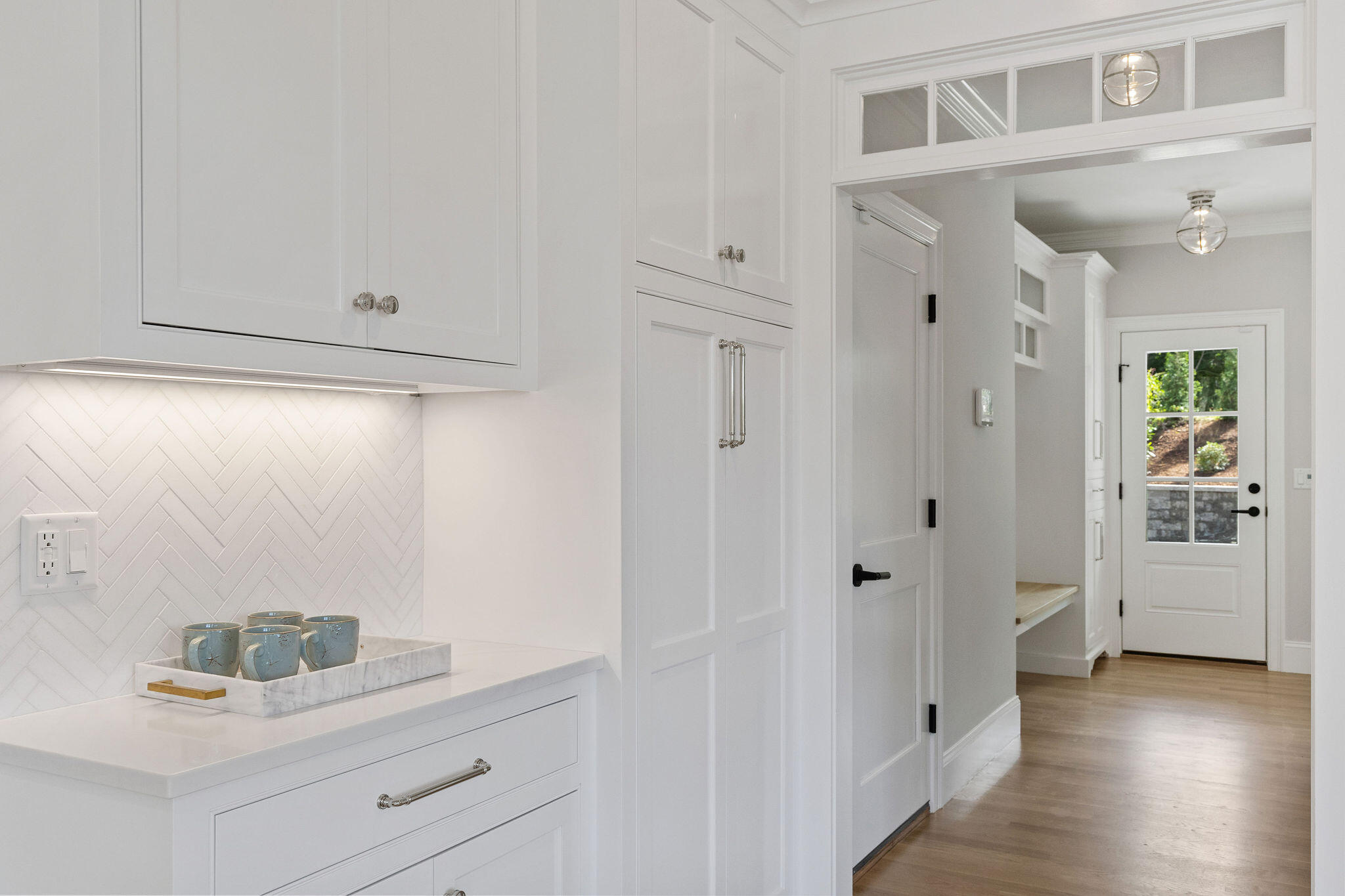 63 Kescayogansett Road Orleans, MA 02653 - Photo 17 of 92 a view of a hallway with wooden floor and closet