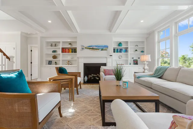 a kitchen with cabinets appliances a sink and a counter top space