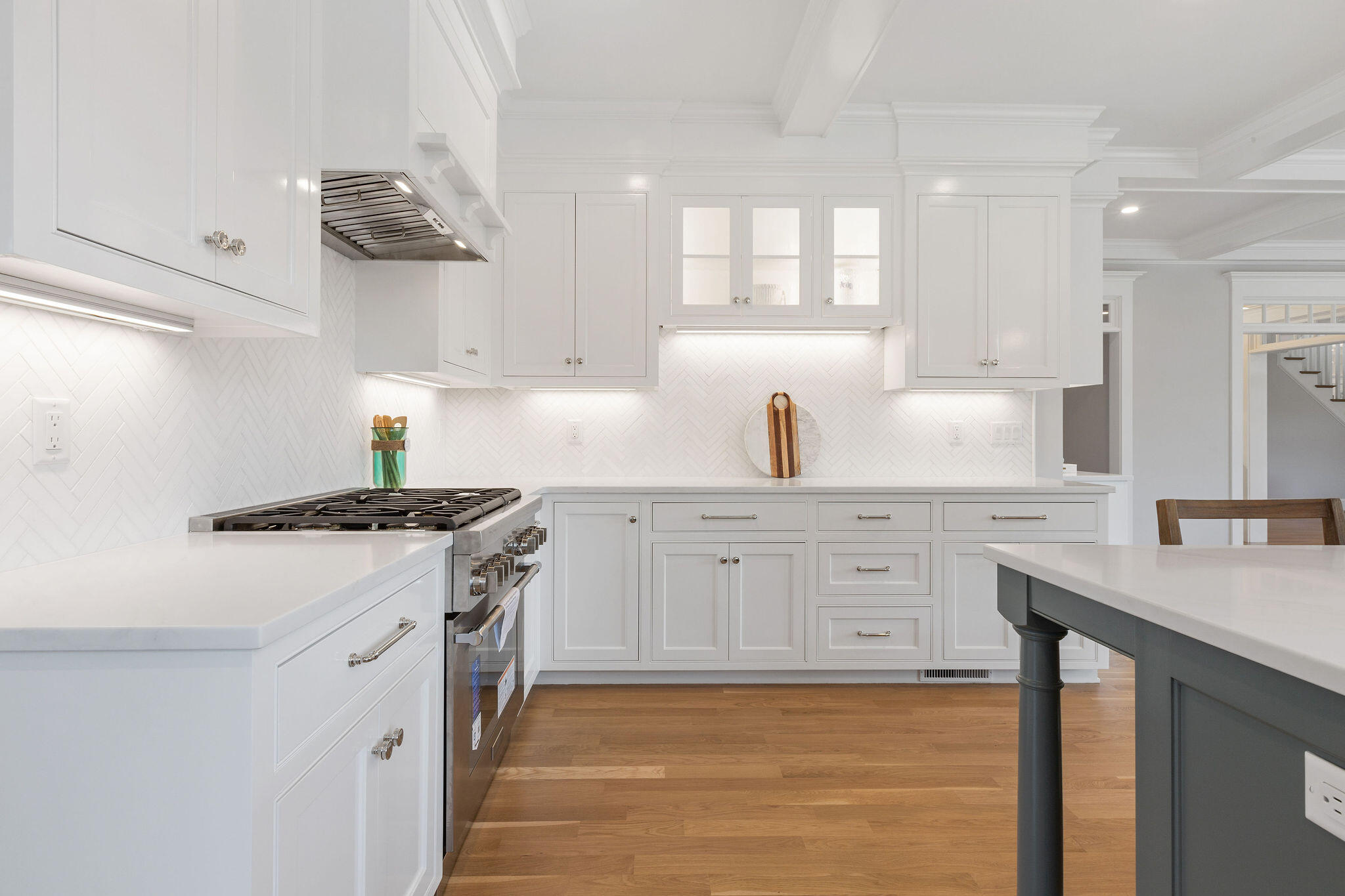 63 Kescayogansett Road Orleans, MA 02653 - Photo 35 of 92 a kitchen with cabinets appliances a sink and a counter top space