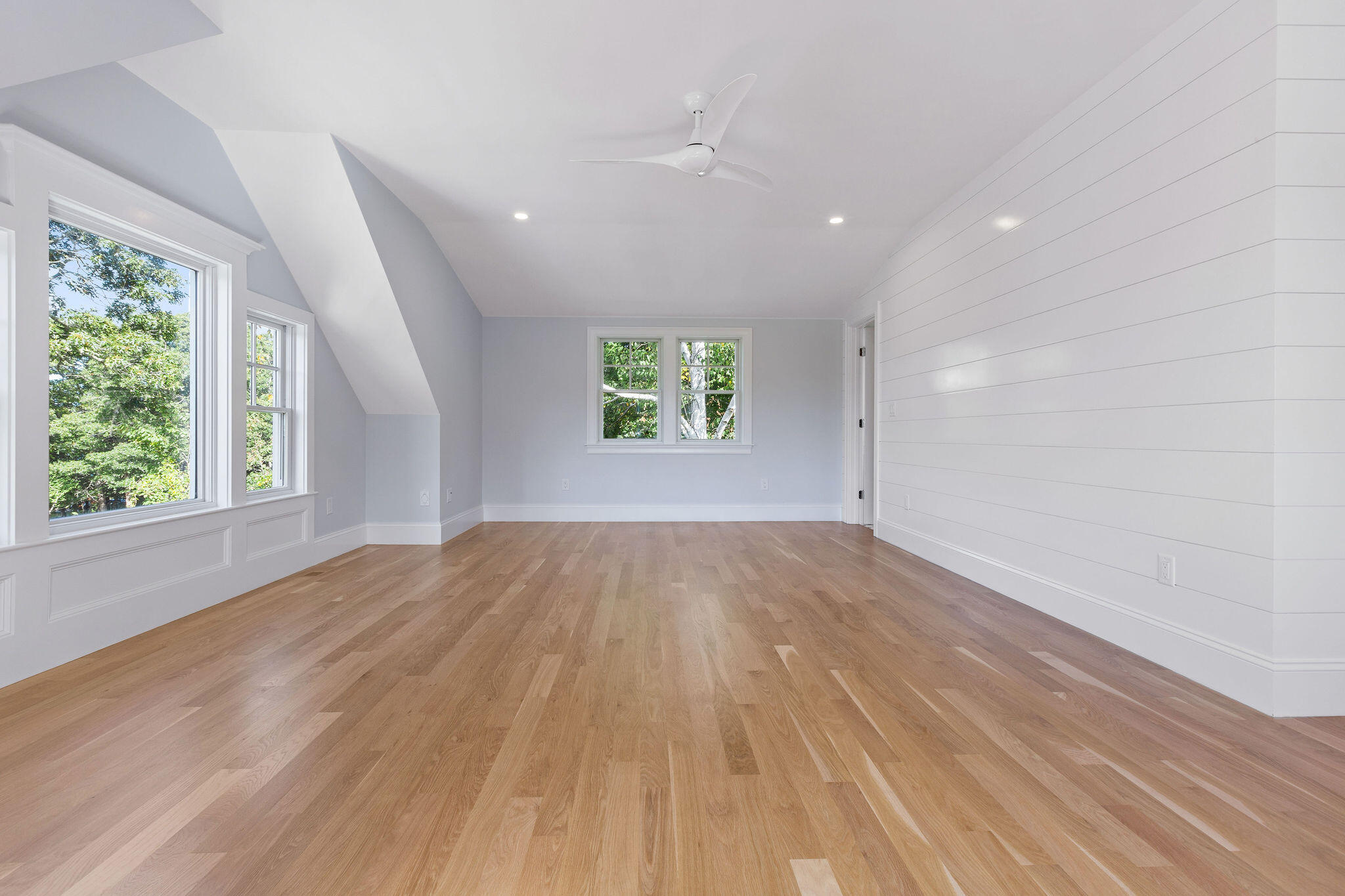 63 Kescayogansett Road Orleans, MA 02653 - Photo 69 of 92 an empty room with wooden floor and windows