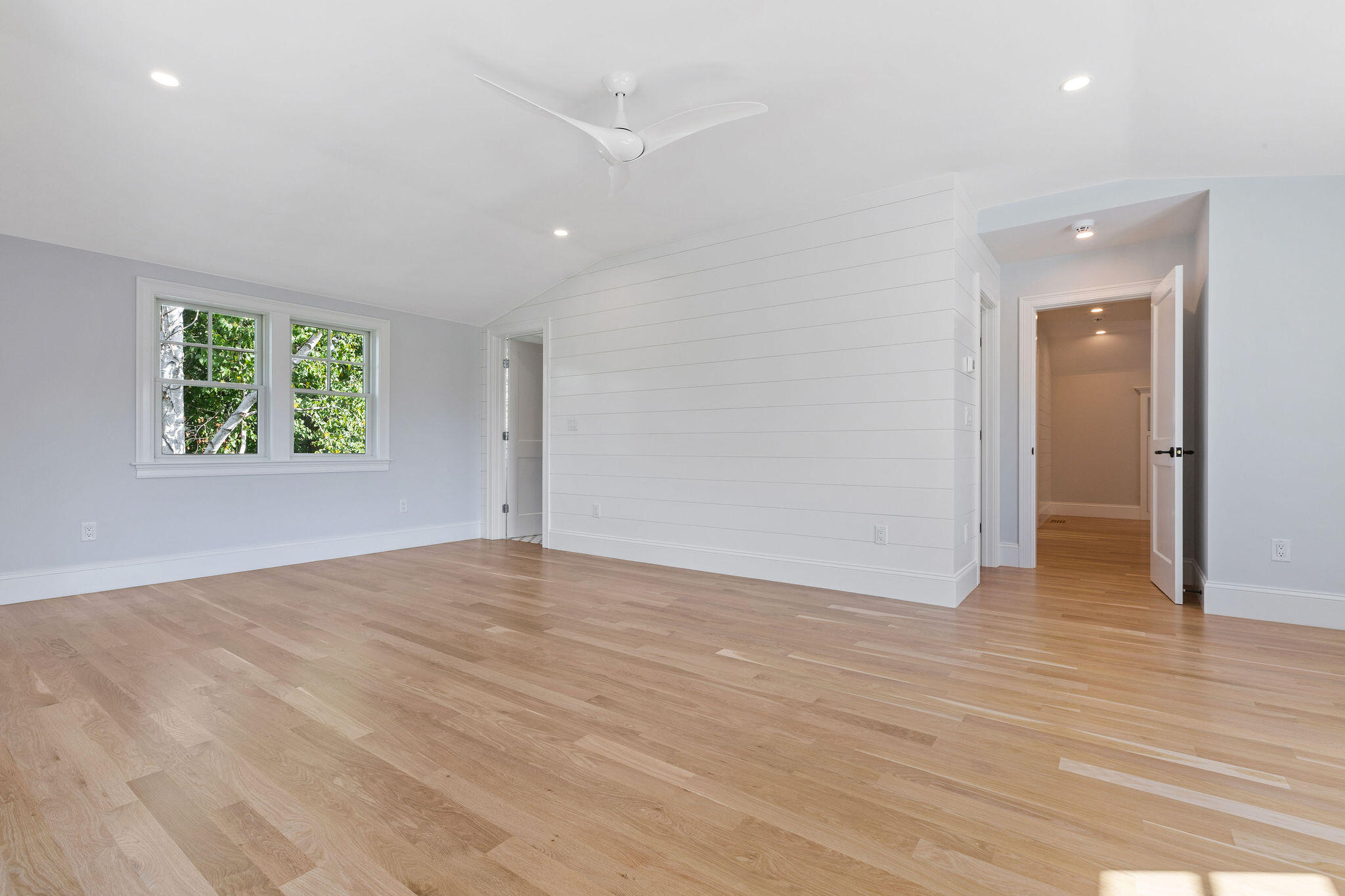 63 Kescayogansett Road Orleans, MA 02653 - Photo 70 of 92 a view of an empty room with wooden floor and a window