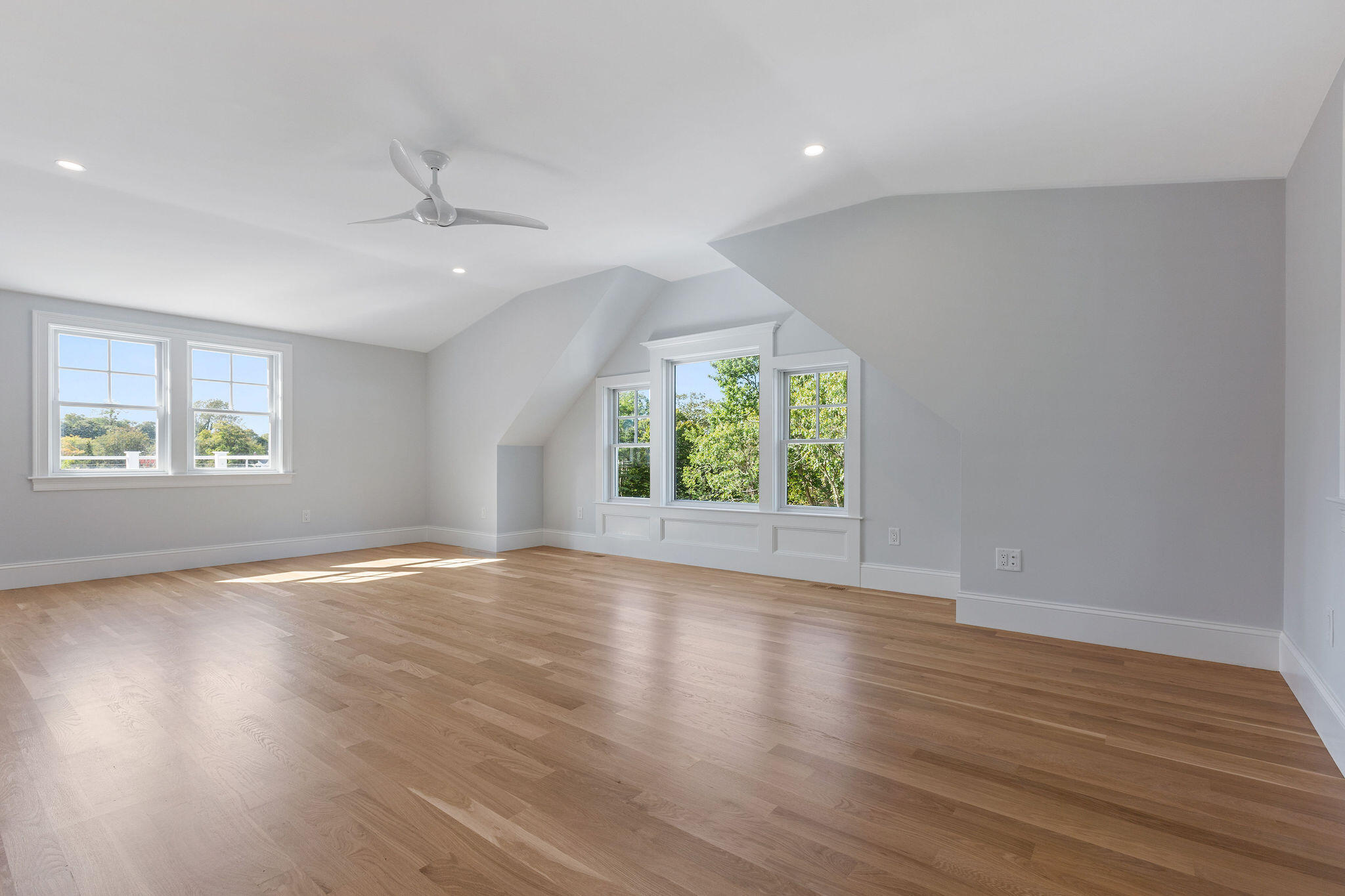 63 Kescayogansett Road Orleans, MA 02653 - Photo 72 of 92 an empty room with wooden floor and windows