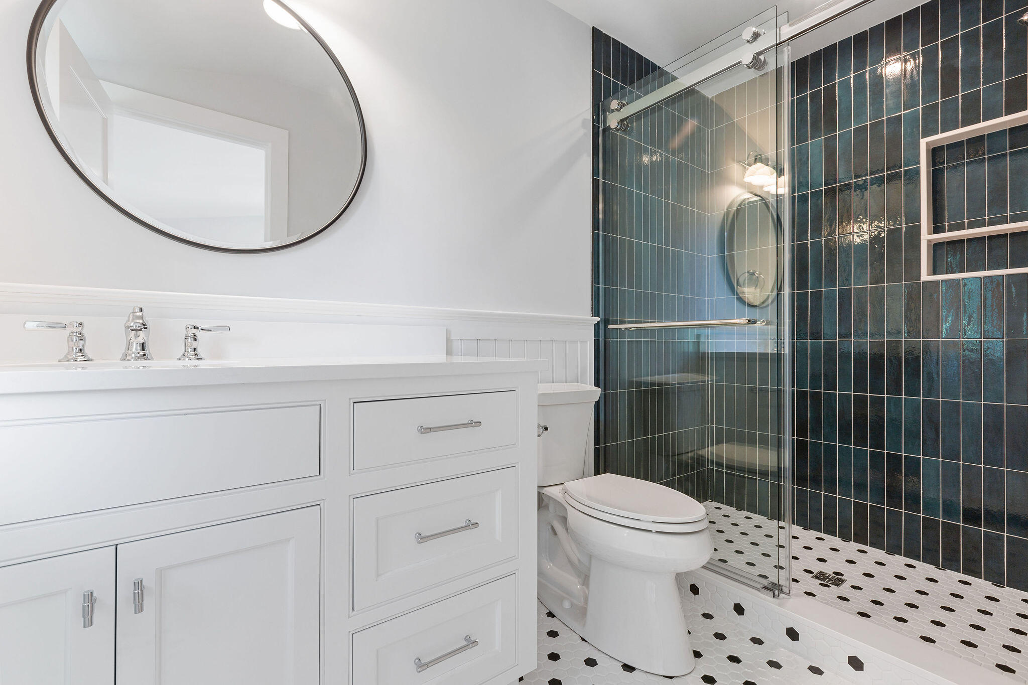 63 Kescayogansett Road Orleans, MA 02653 - Photo 73 of 92 a bathroom with a toilet a sink a mirror and shower