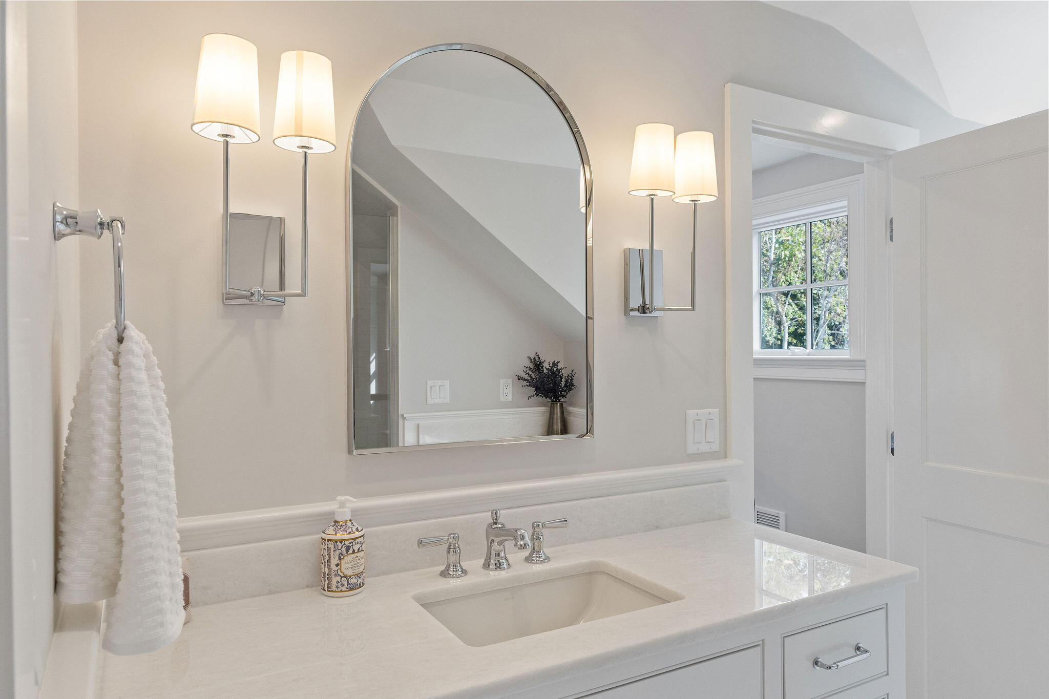 63 Kescayogansett Road Orleans, MA 02653 - Photo 76 of 92 a bathroom with a sink and a mirror