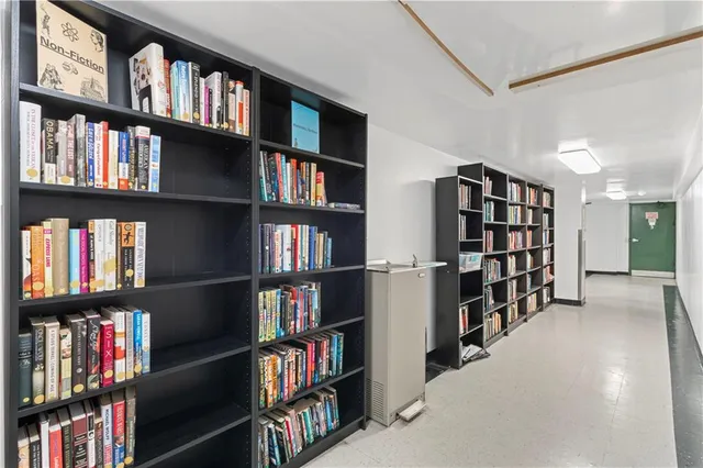 a kitchen with a table chairs and a stove
