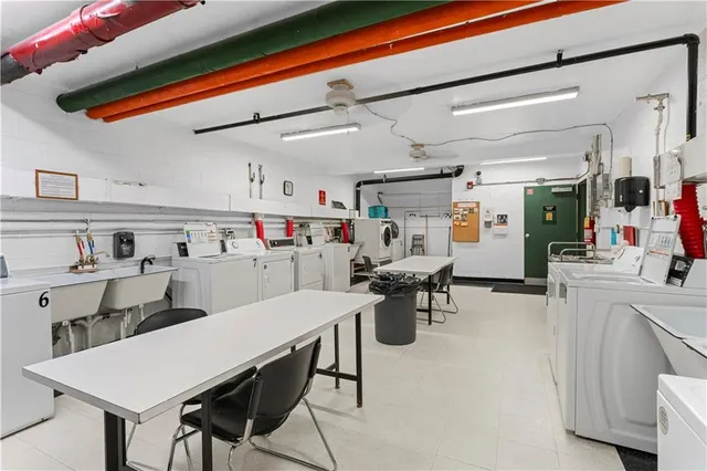 a view of parking garage with cars