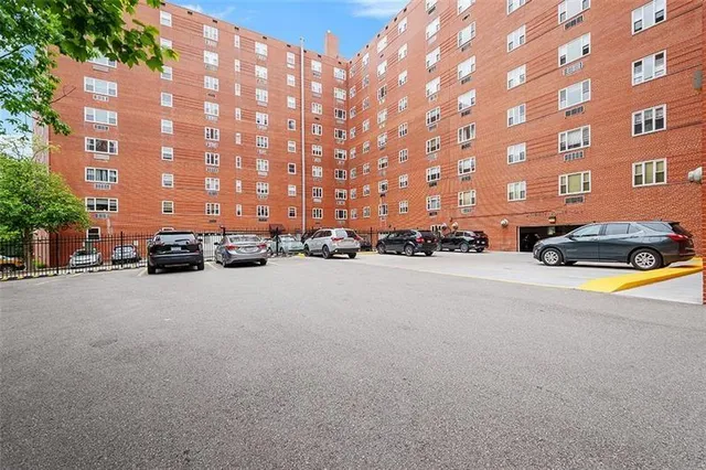 a view of a chair and tables in the balcony