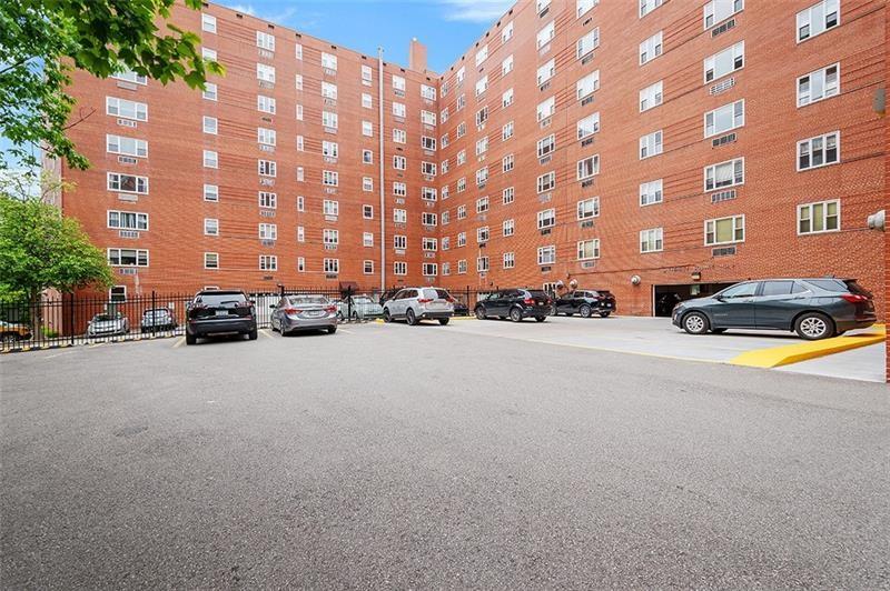 4601 Fifth Avenue, Unit 327 Pittsburgh, PA 15213 - Photo 24 of 25 a car parked in front of a building