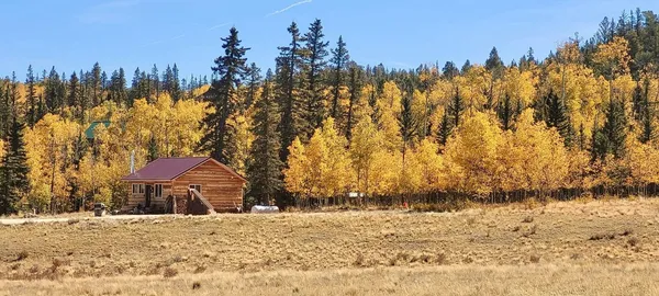 a view of a backyard of the house