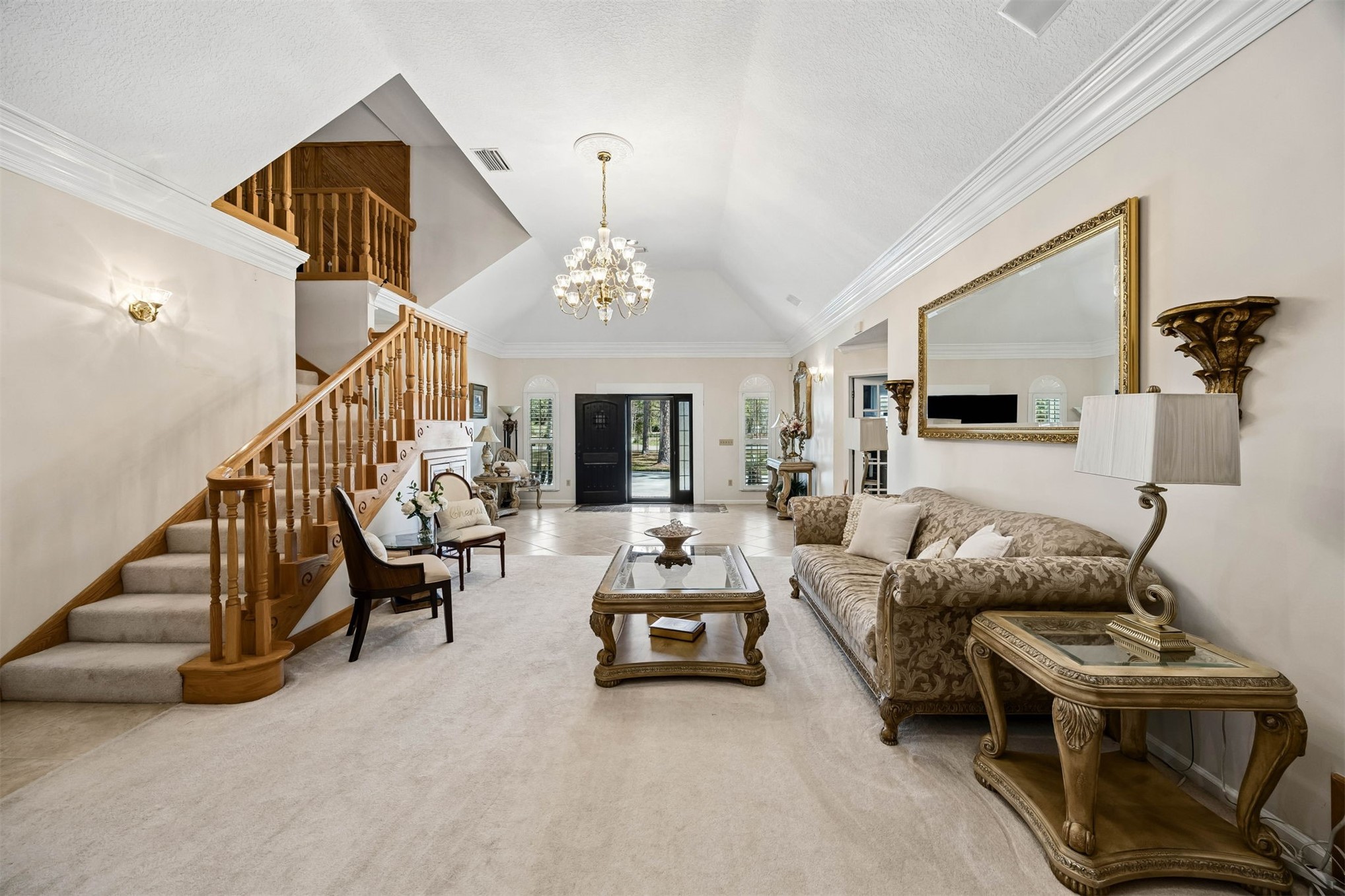 376488 Kings Ferry Road Hilliard, FL 32046 - Photo 19 of 73 a living room with furniture and a chandelier