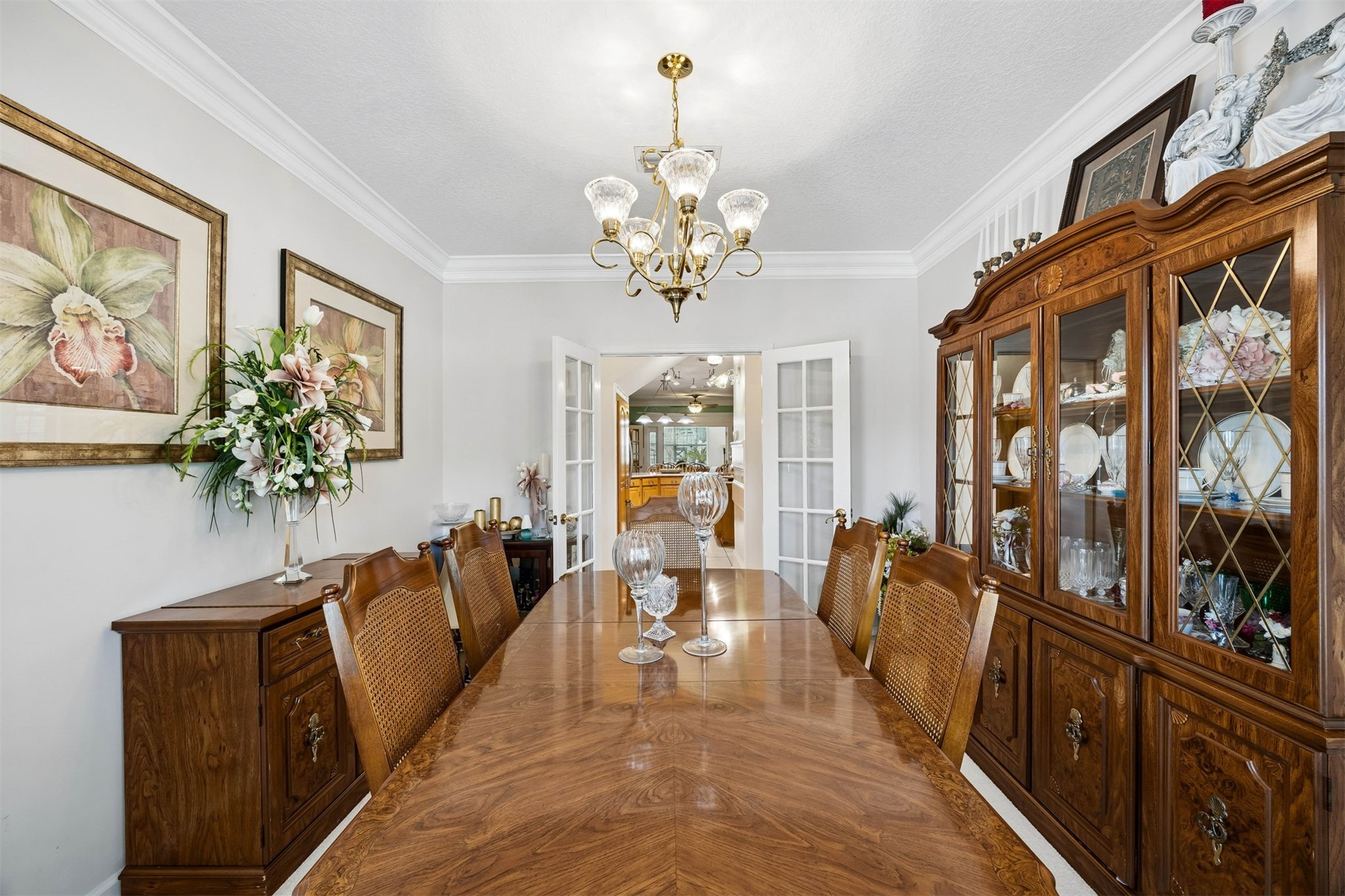 376488 Kings Ferry Road Hilliard, FL 32046 - Photo 21 of 73 a view of a dining room with furniture wooden floor and chandelier
