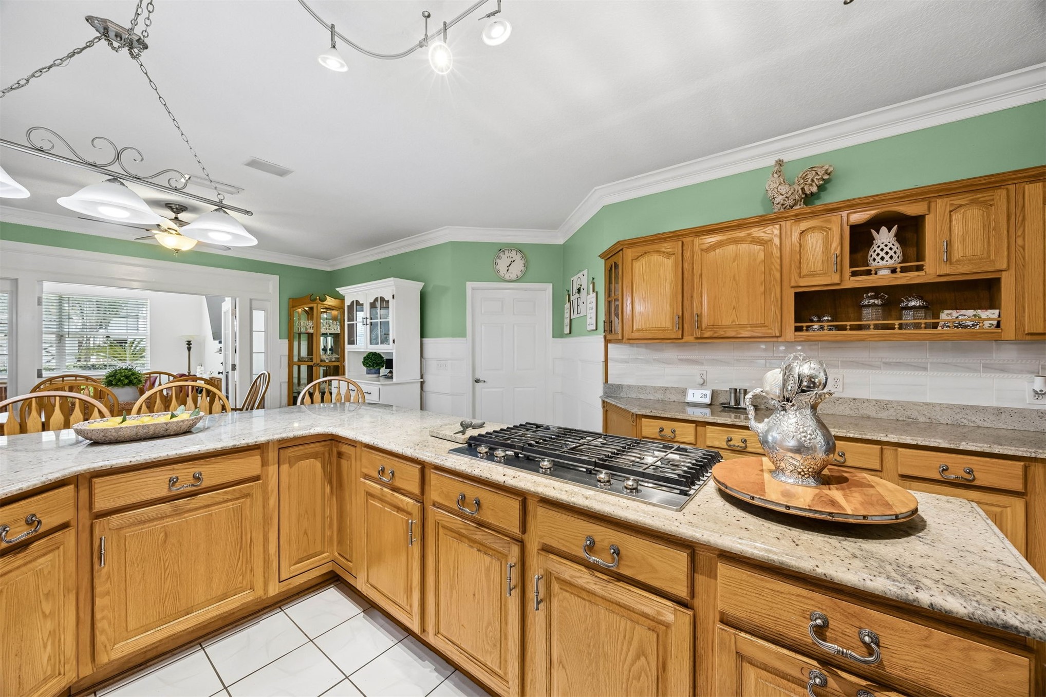 376488 Kings Ferry Road Hilliard, FL 32046 - Photo 24 of 73 a kitchen with sink cabinets and window