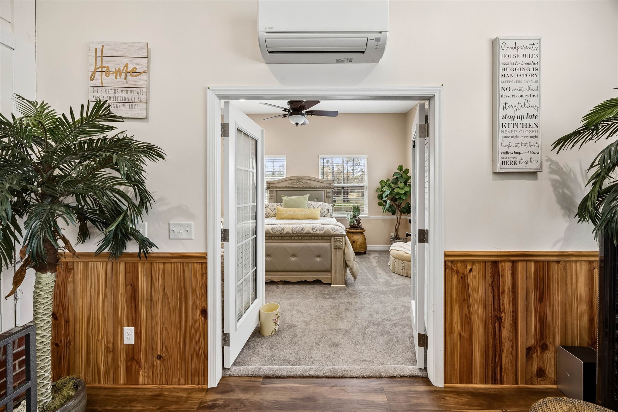 376488 Kings Ferry Road Hilliard, FL 32046 - Photo 44 of 73 a bedroom with furniture and a potted plant