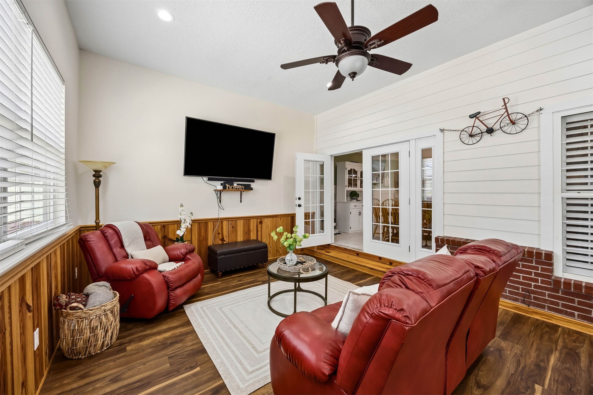 376488 Kings Ferry Road Hilliard, FL 32046 - Photo 46 of 73 a living room with furniture and a flat screen tv