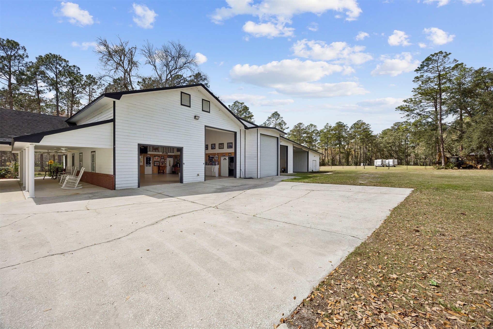 376488 Kings Ferry Road Hilliard, FL 32046 - Photo 8 of 73 a view of a house with a backyard