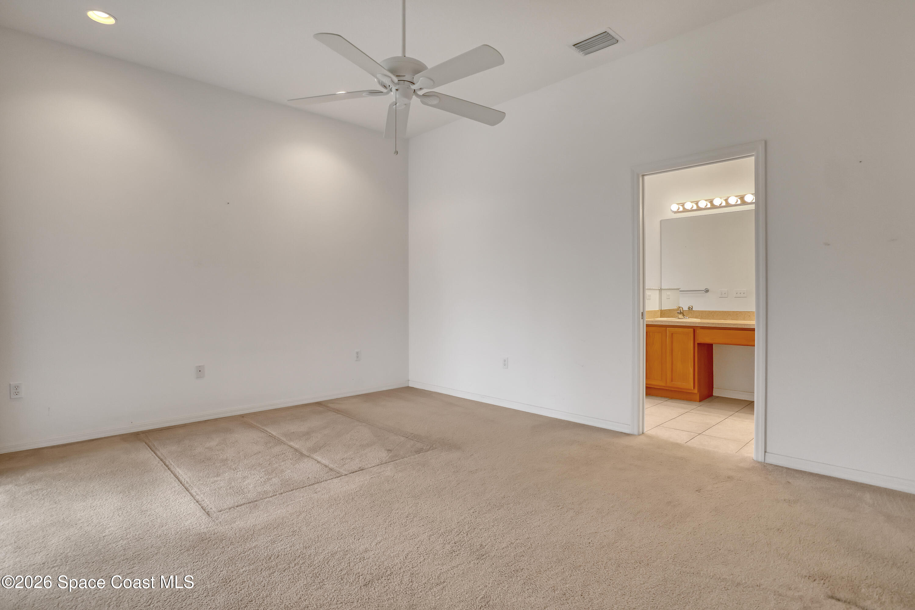 4892 Outlook Drive Melbourne, FL 32940 - Photo 16 of 34 an empty room with a bathroom