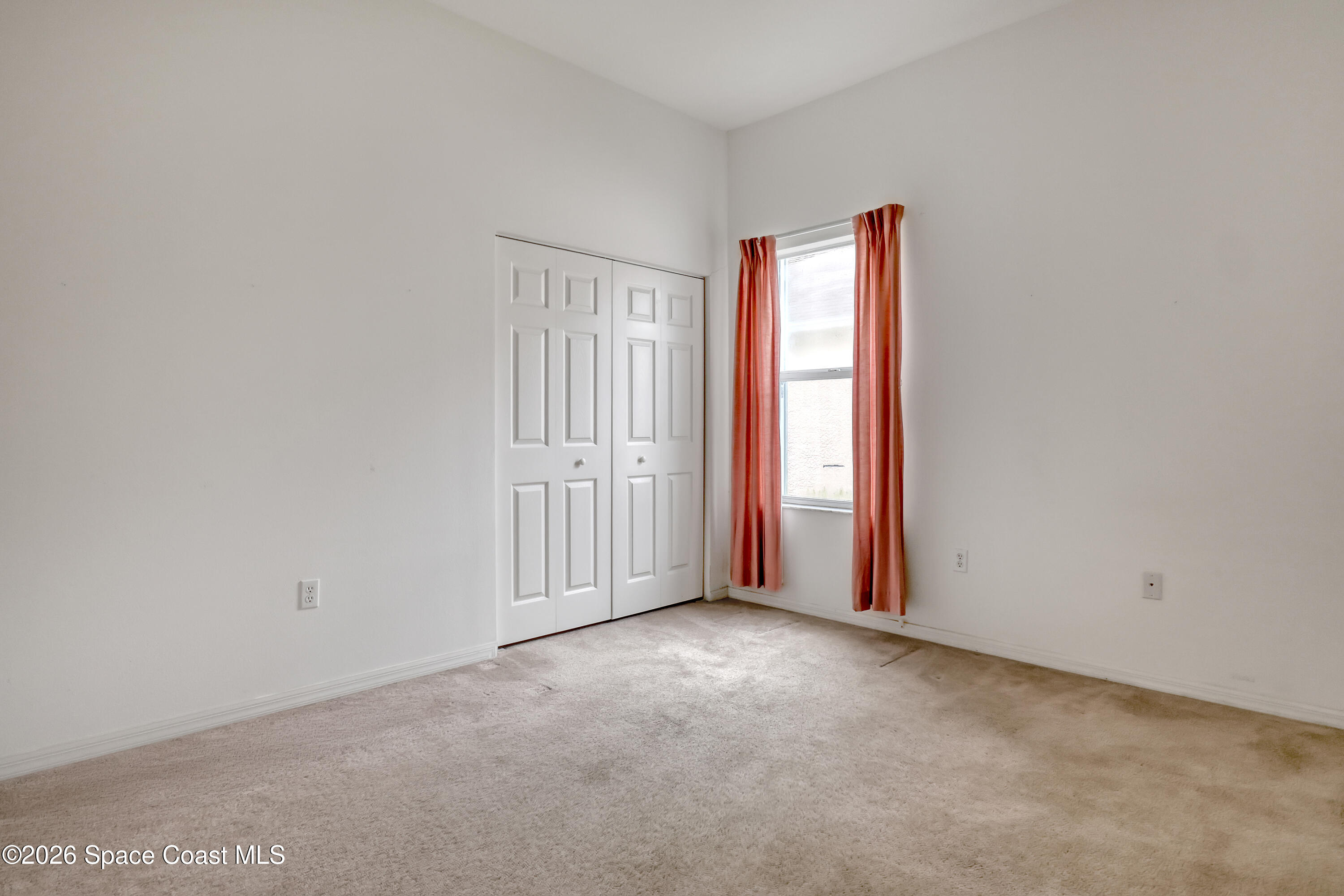 4892 Outlook Drive Melbourne, FL 32940 - Photo 25 of 34 a view of empty room with window
