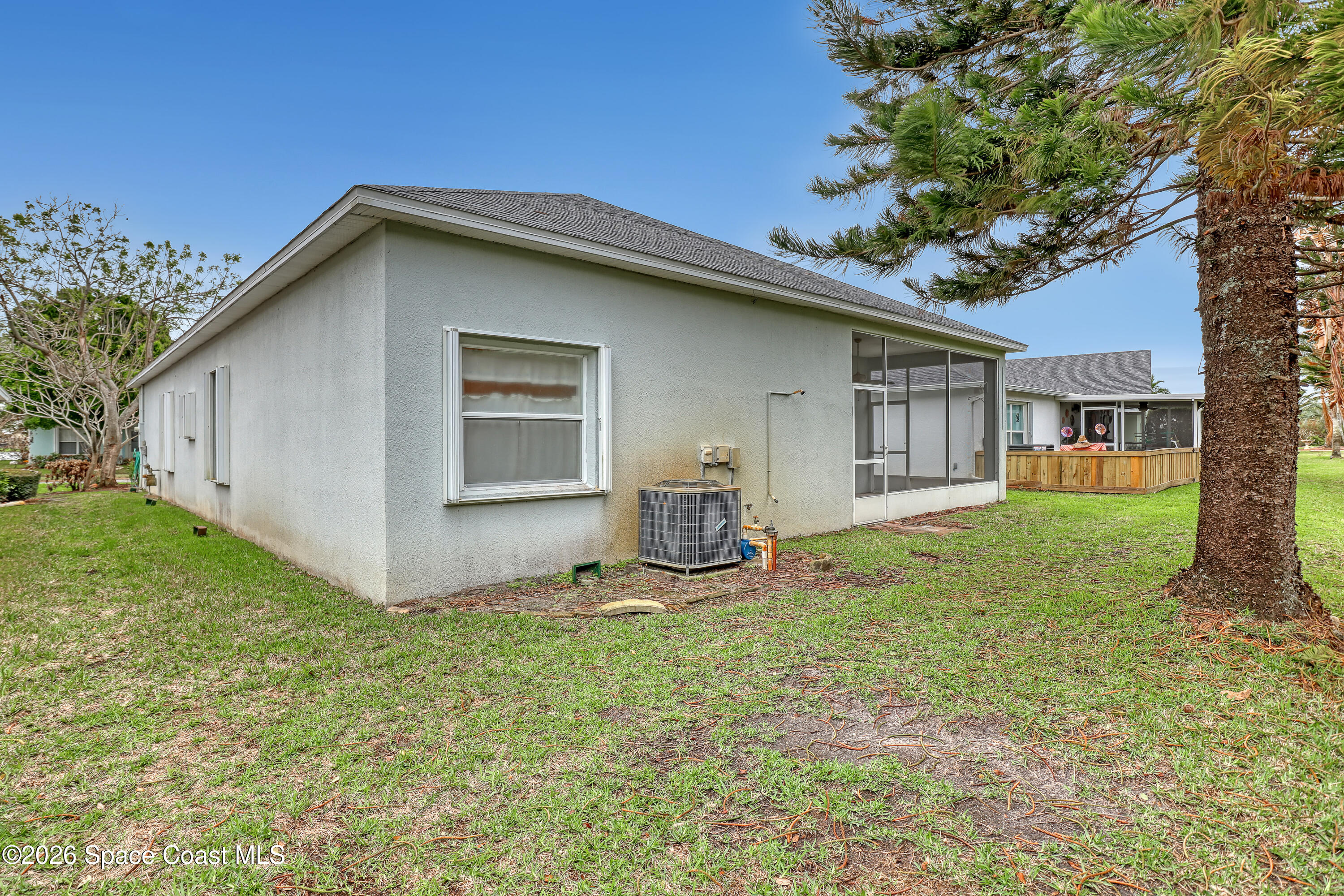 4892 Outlook Drive Melbourne, FL 32940 - Photo 30 of 34 a view of a house with a yard