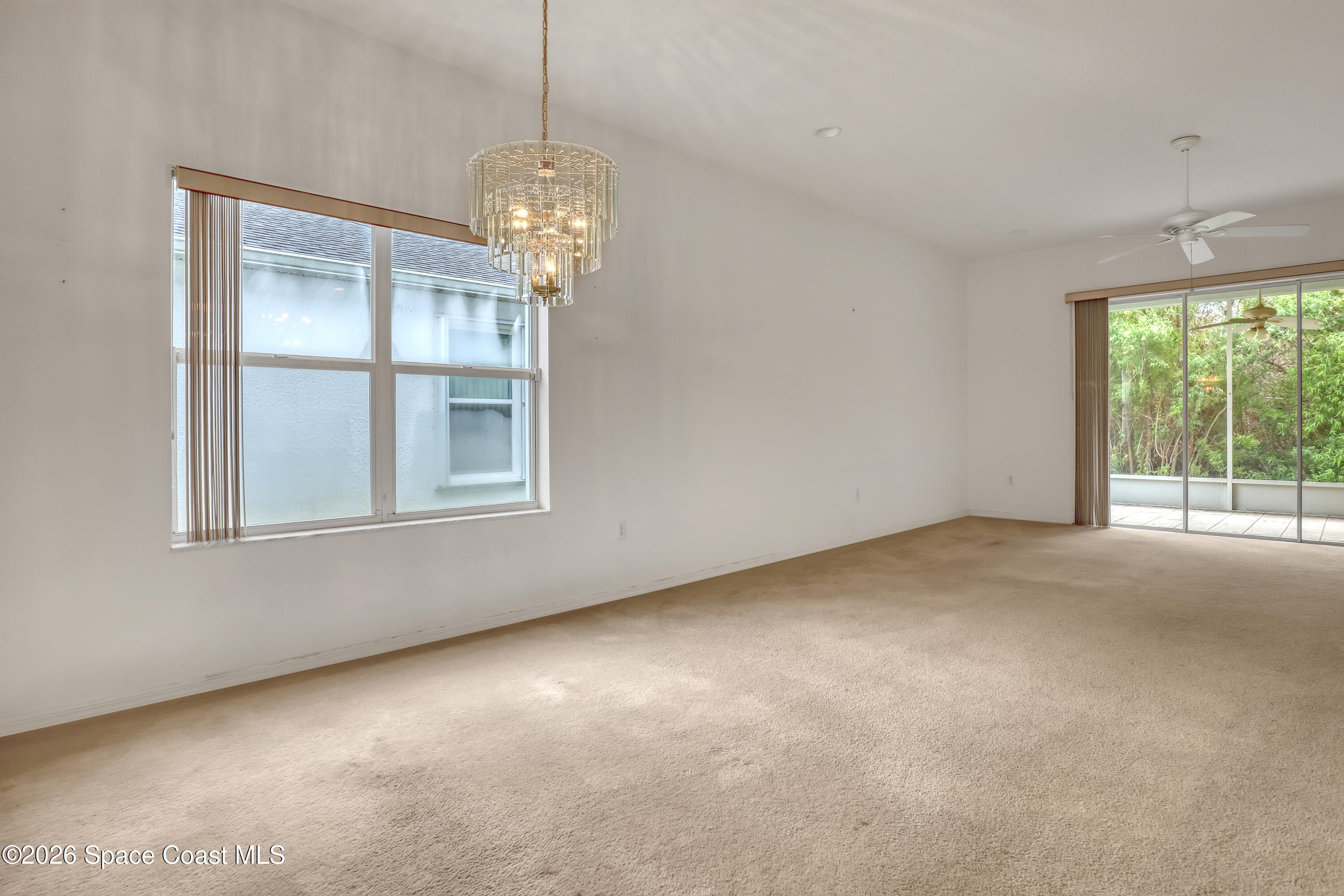 4892 Outlook Drive Melbourne, FL 32940 - Photo 10 of 34 a view of an empty room with a window