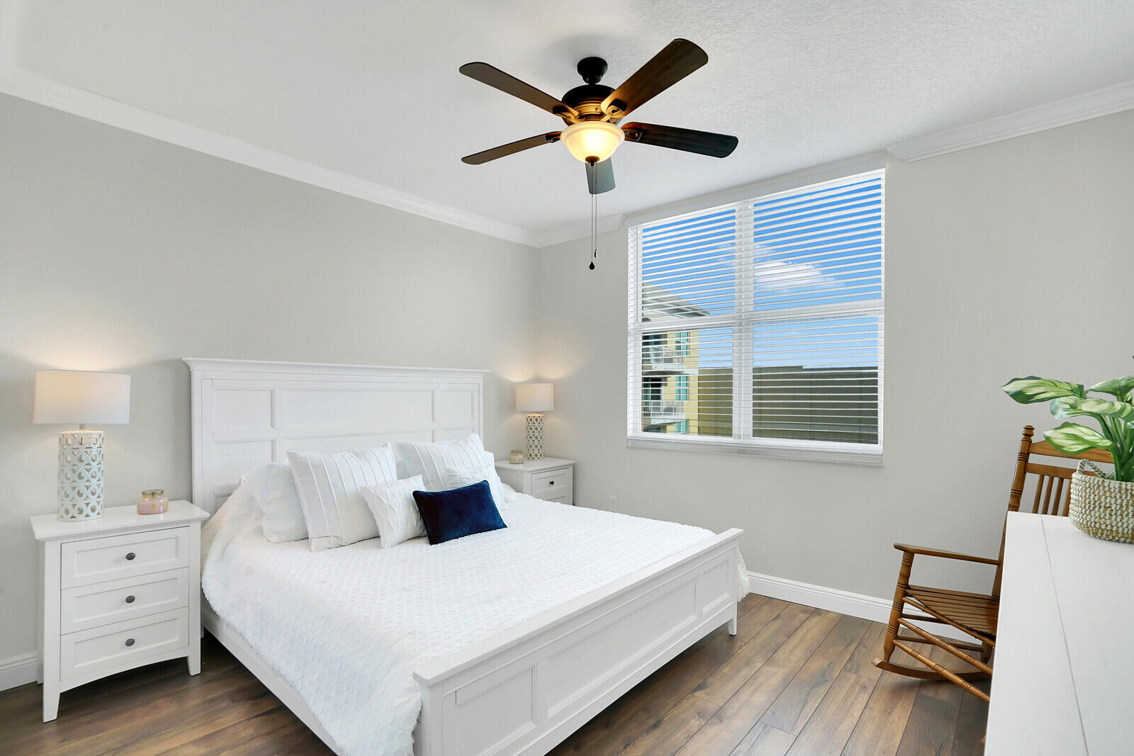 804 East Windward Way, Unit 608 Lantana, FL 33462 - Photo 19 of 33 a bed room with bed and window