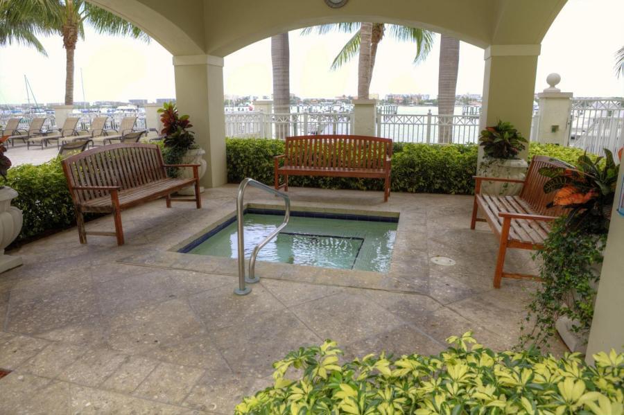 804 East Windward Way, Unit 608 Lantana, FL 33462 - Photo 27 of 33 a roof deck with couches and potted plants