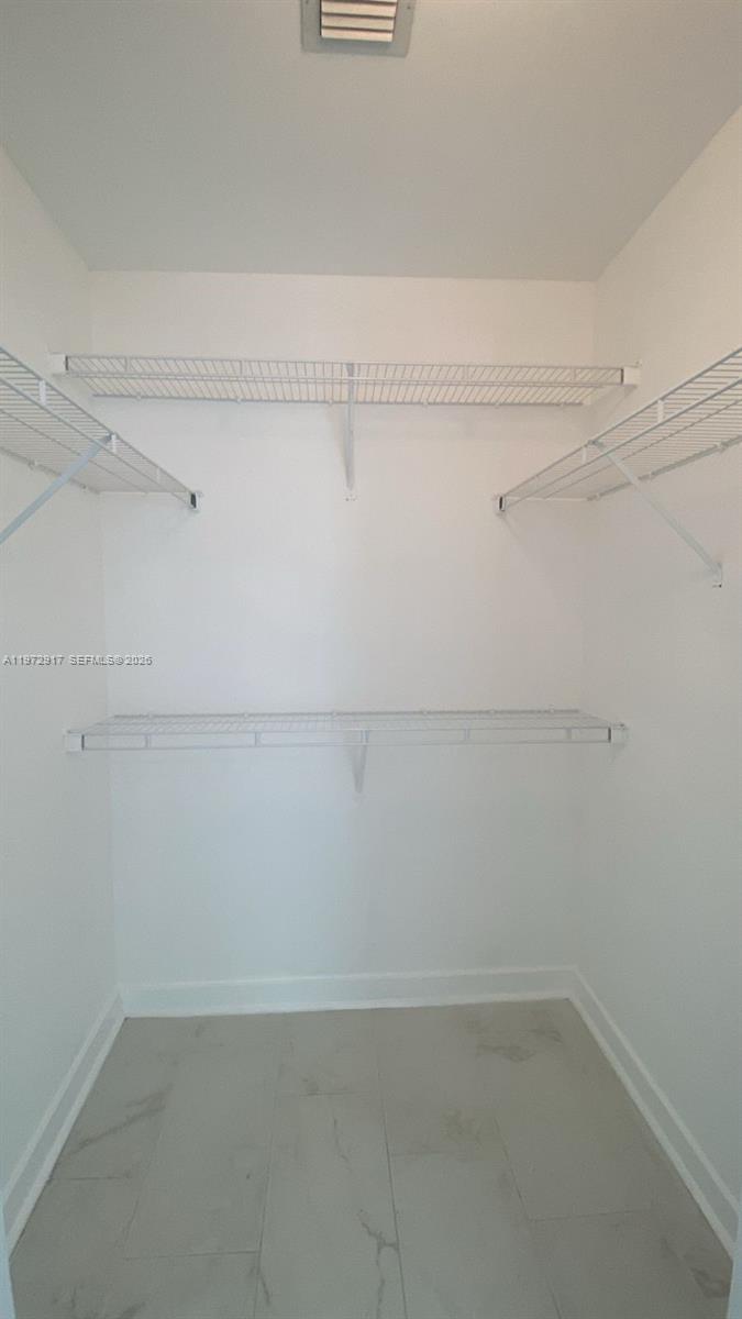 1111 Southwest 1st Avenue, Unit 2016N Miami, FL 33130 - Photo 12 of 20 a view of a closet