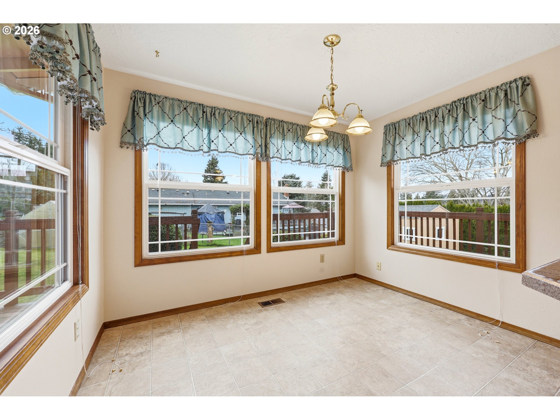 419 Southwest Day Court Gresham, OR 97080 - Photo 15 of 44 a view of an empty room with a window