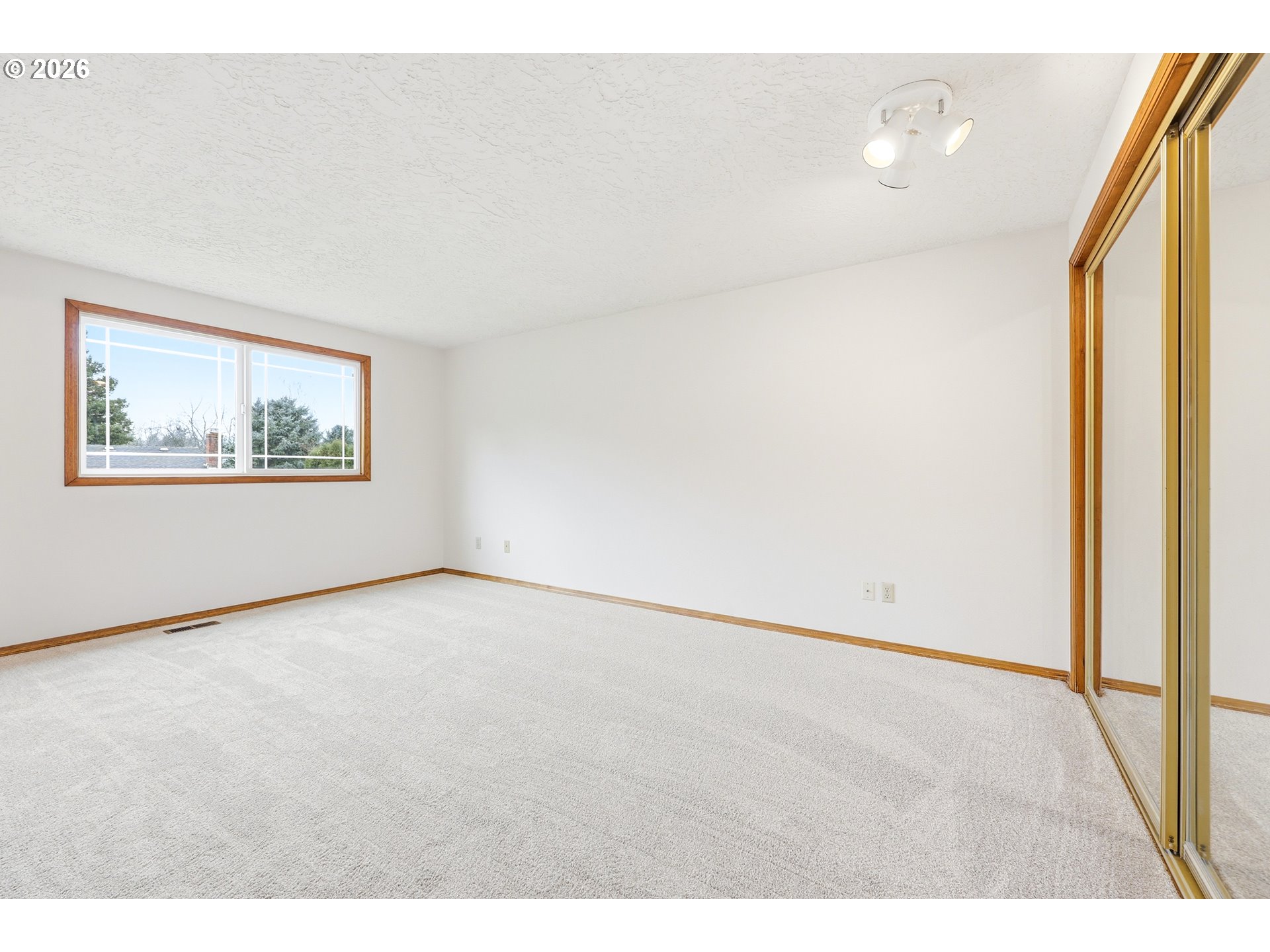 419 Southwest Day Court Gresham, OR 97080 - Photo 22 of 44 a view of an empty room with a window