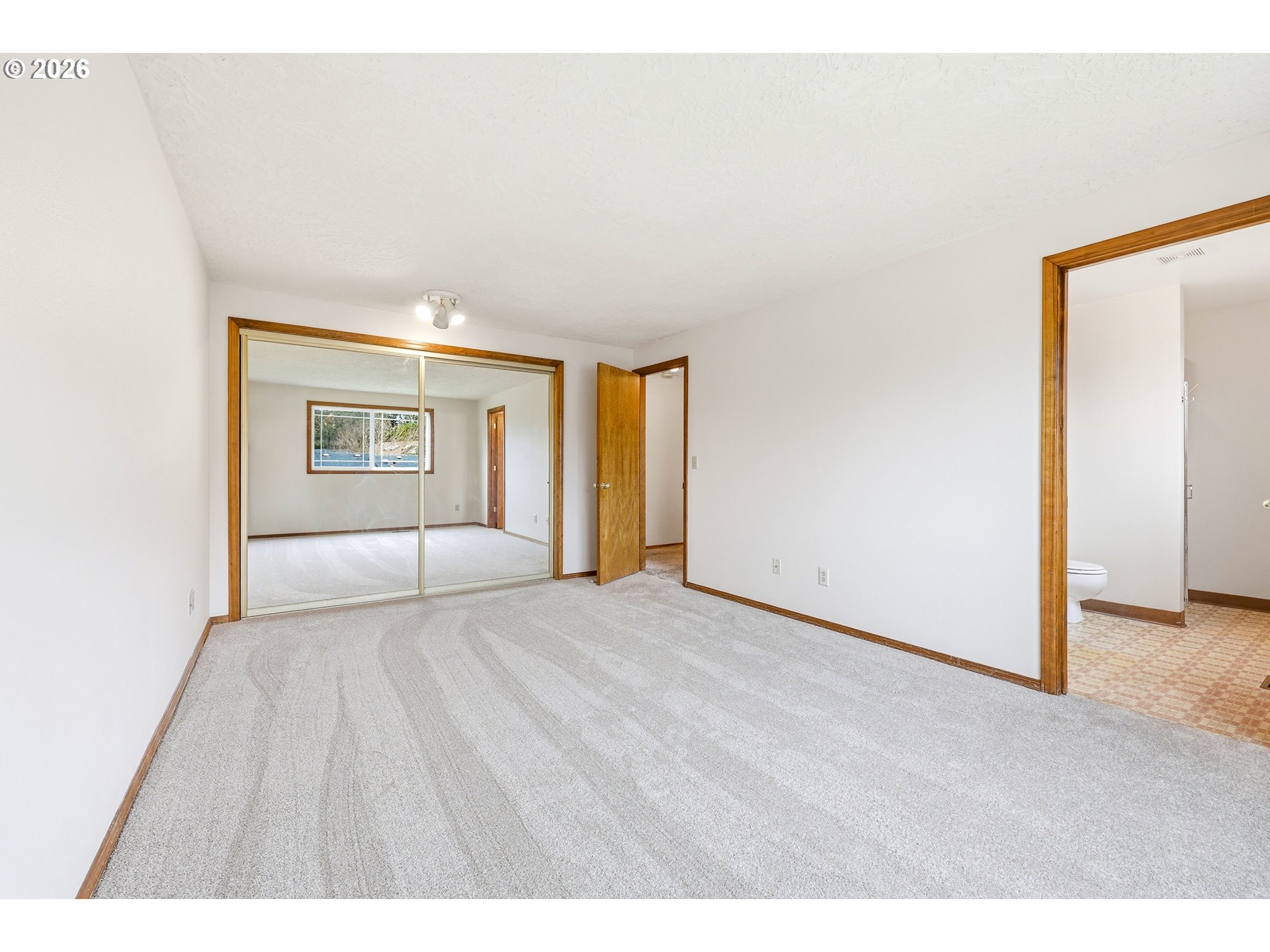 419 Southwest Day Court Gresham, OR 97080 - Photo 23 of 44 a view of an empty room with a window