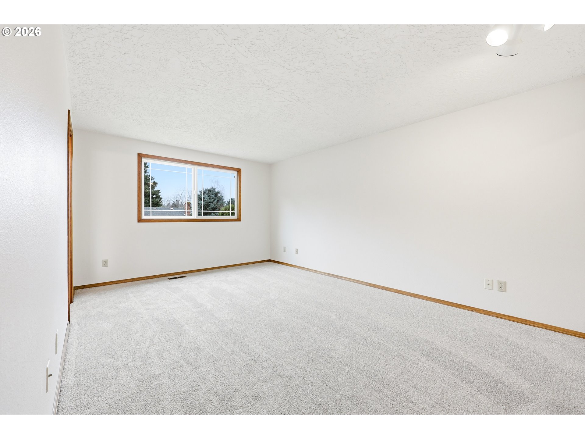 419 Southwest Day Court Gresham, OR 97080 - Photo 24 of 44 a view of an empty room with a window