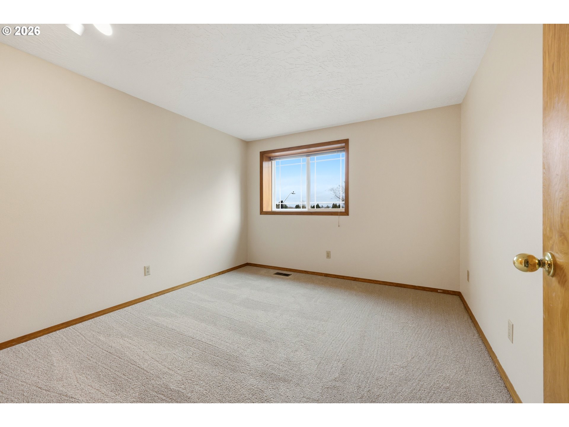 419 Southwest Day Court Gresham, OR 97080 - Photo 25 of 44 a view of an empty room with a window